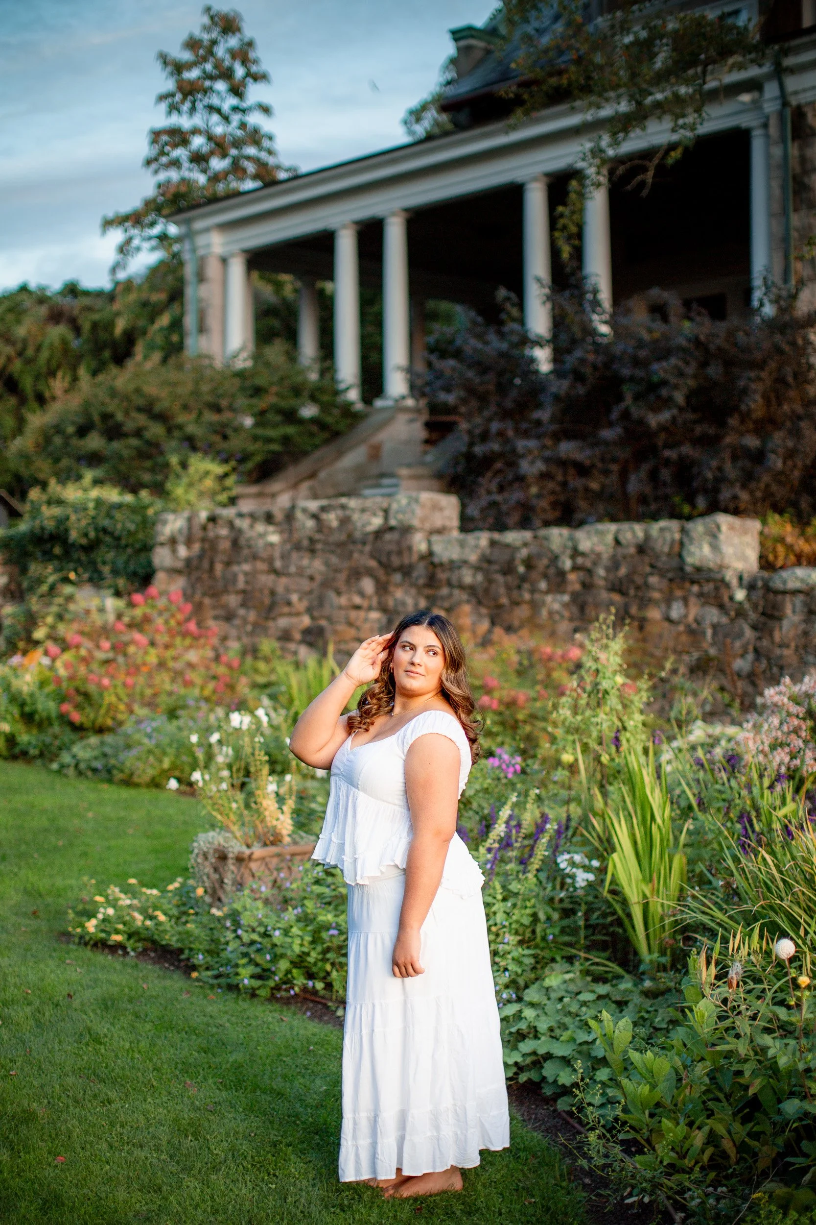 Mansfield MA senior photos at Blithewold Mansion and gardens in the background