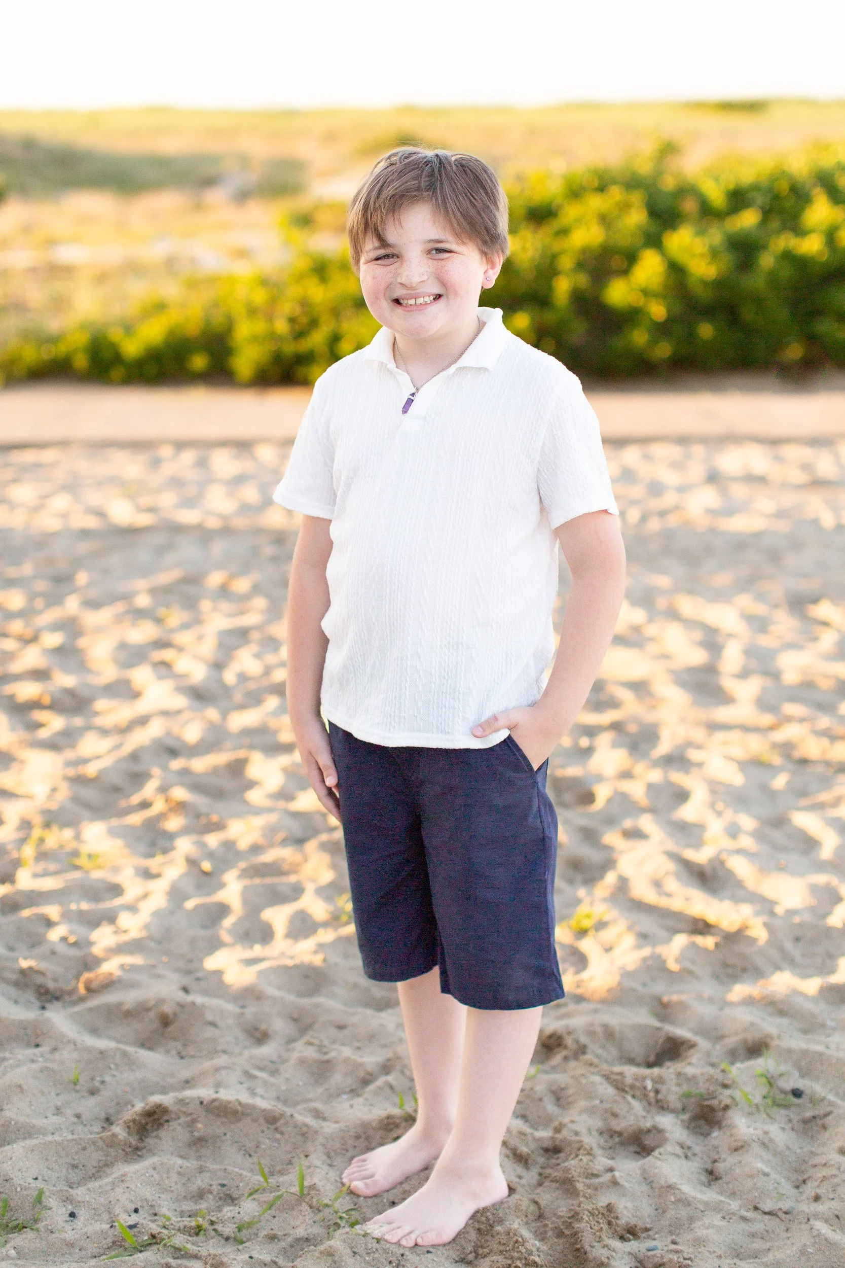 Individual portrait during an extended family session at Scusset Beach.