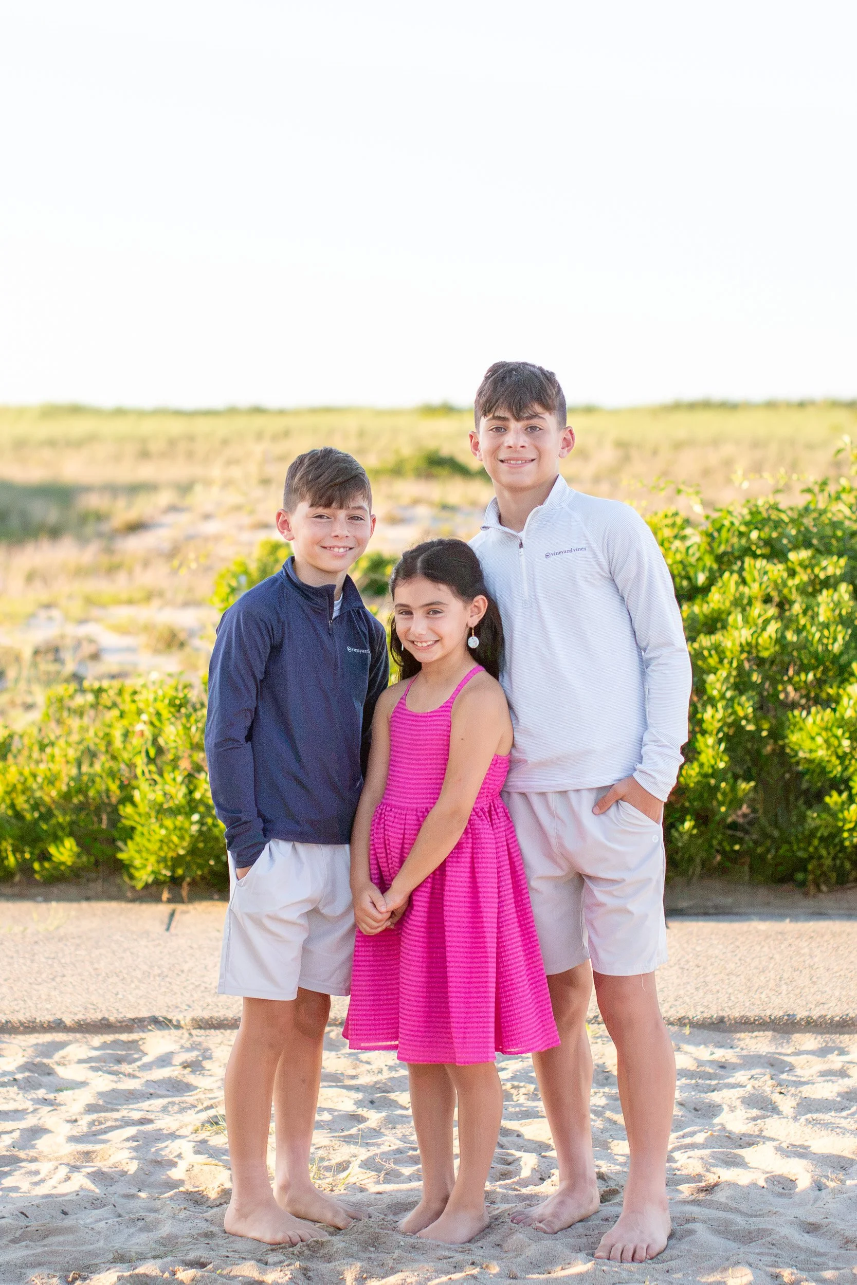 Individual sibling portrait during an extended family session at Scusset Beach.