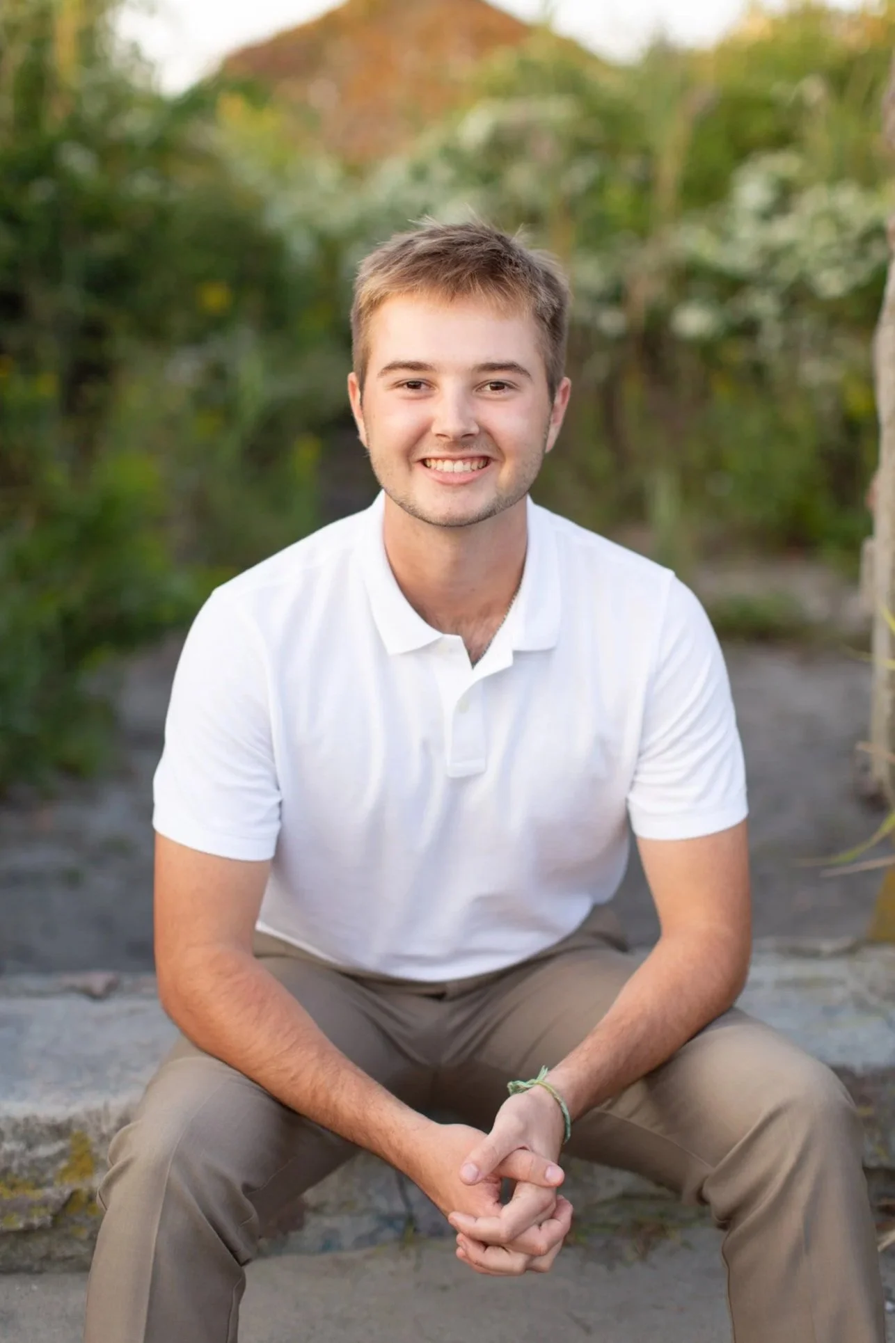Close-up senior portrait of Sean at Scarborough Beach in soft coastal light