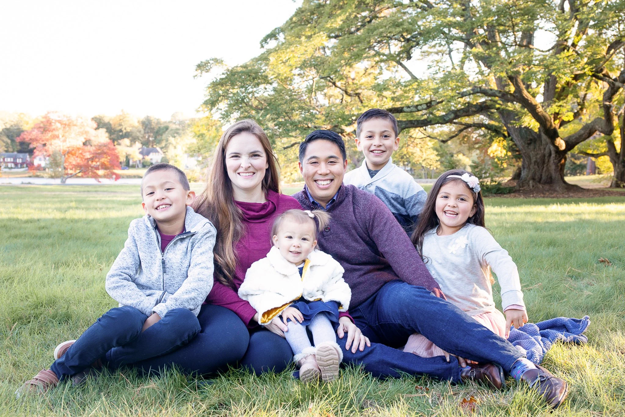 Family portrait during a fall session at Oliver Ames Estate in Easton MA