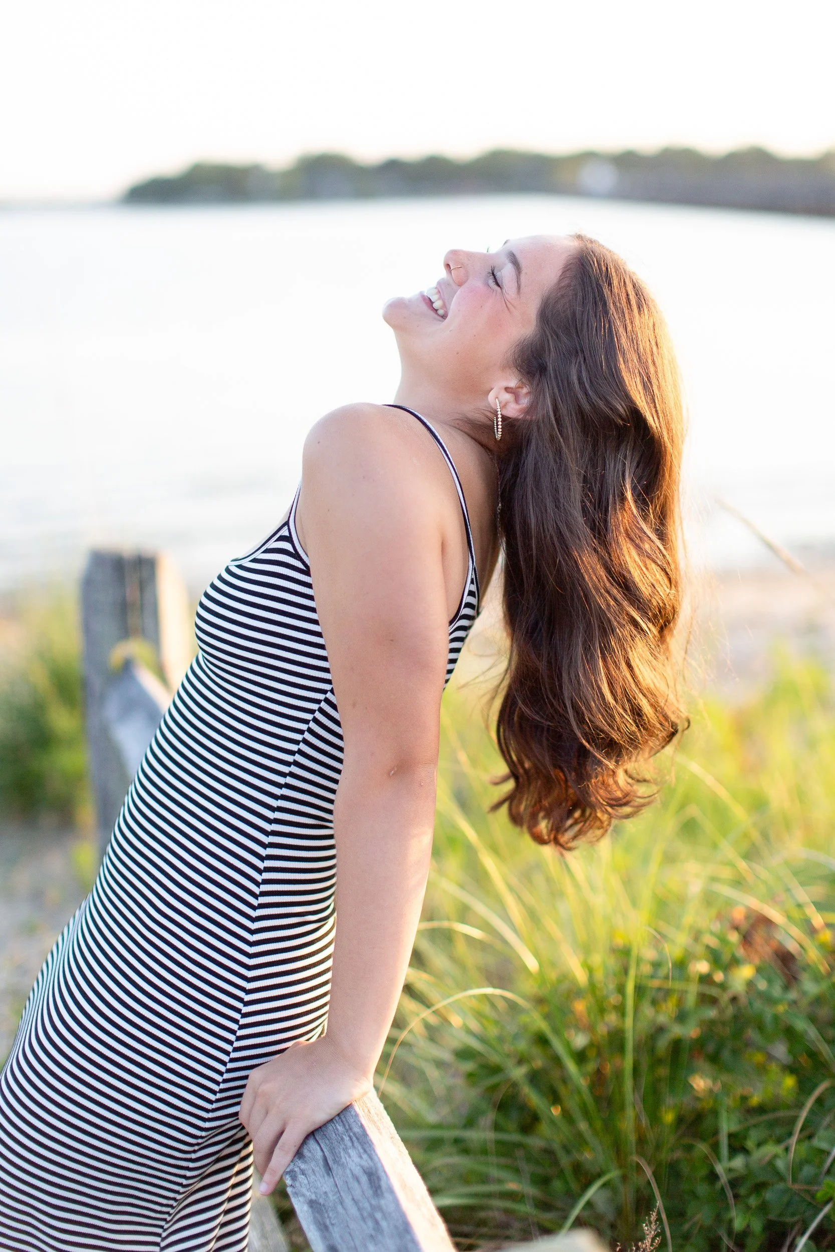 Golden hour senior portrait at Duxbury Beach for an Oliver Ames High School senior.