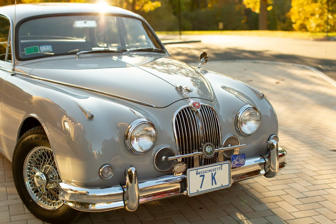 Refined vintage car outside Larz Anderson Museum in Brookline, evoking luxury and boutique photography experience.