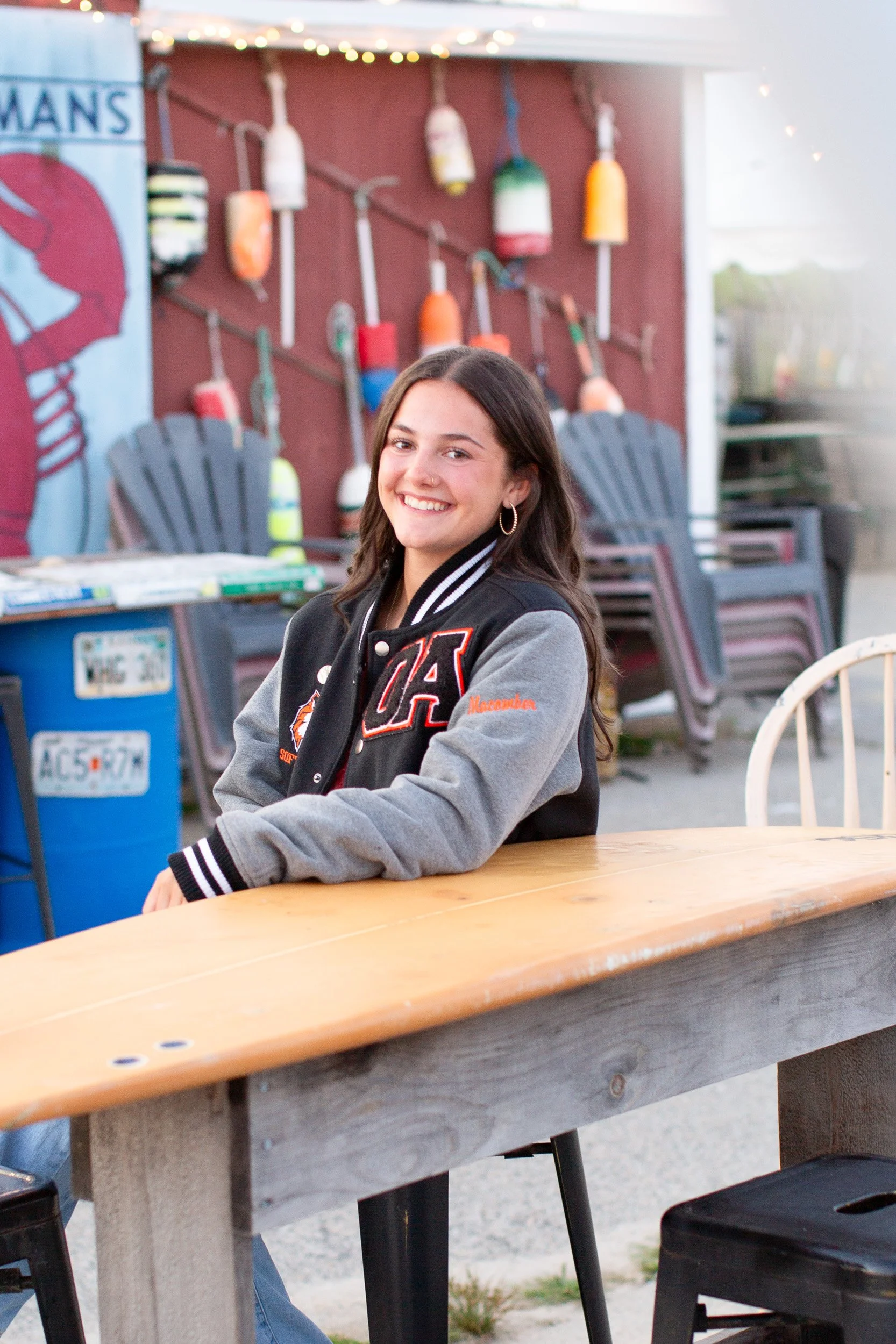 Relaxed senior photo of Logan during her Easton senior portrait session at Duxbury Beach.