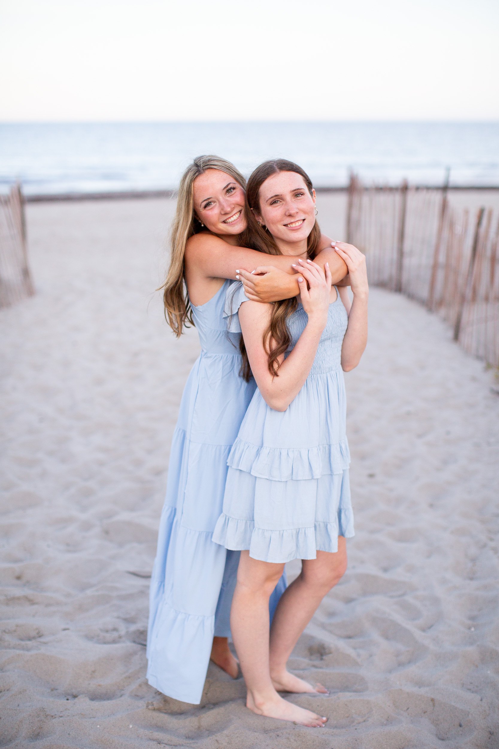 Twin senior portraits at Scarborough Beach in Narragansett Rhode Island