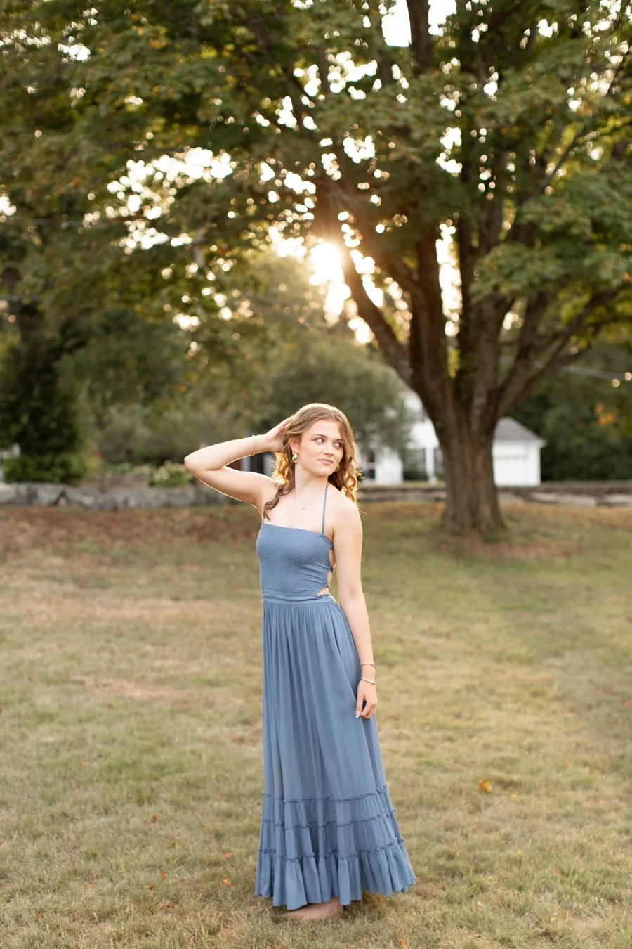 Senior portrait in natural light showing natural confidence during a Milton MA photo session