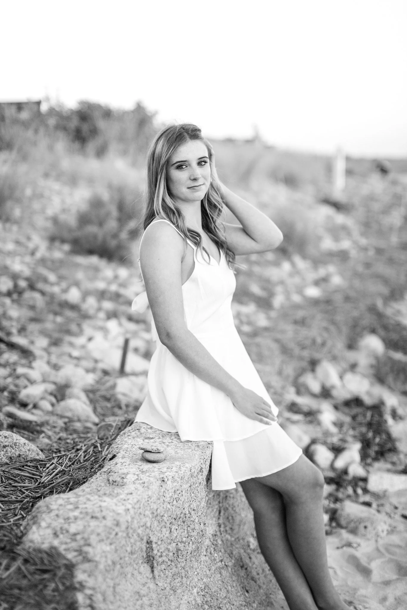 Mansfield MA senior photographer capturing a Class of 2026 senior portrait at Duxbury Beach during golden hour.