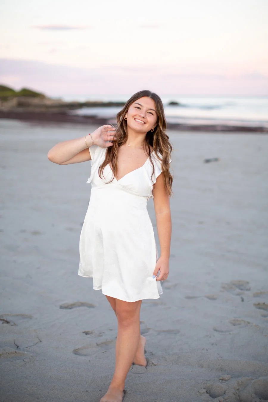 Senior photo session at Scarborough Beach in Narragansett during summer sunset