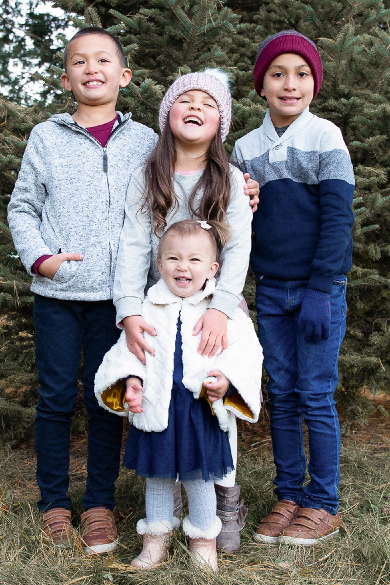 Children laughing during a fall family session in Easton Massachusetts