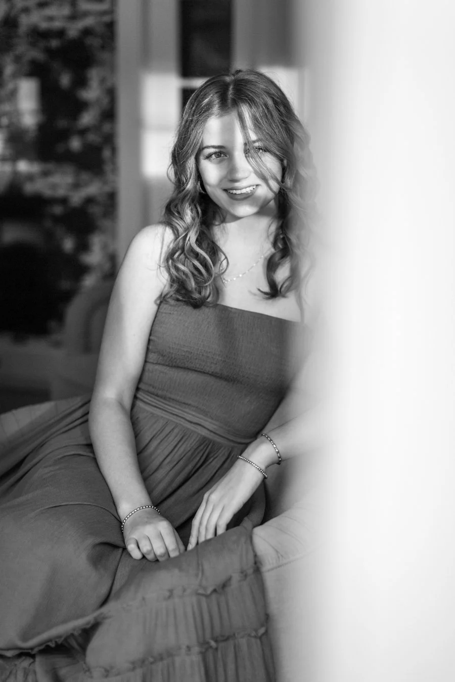 Candid senior portrait showing natural smile during a Milton MA photo session
