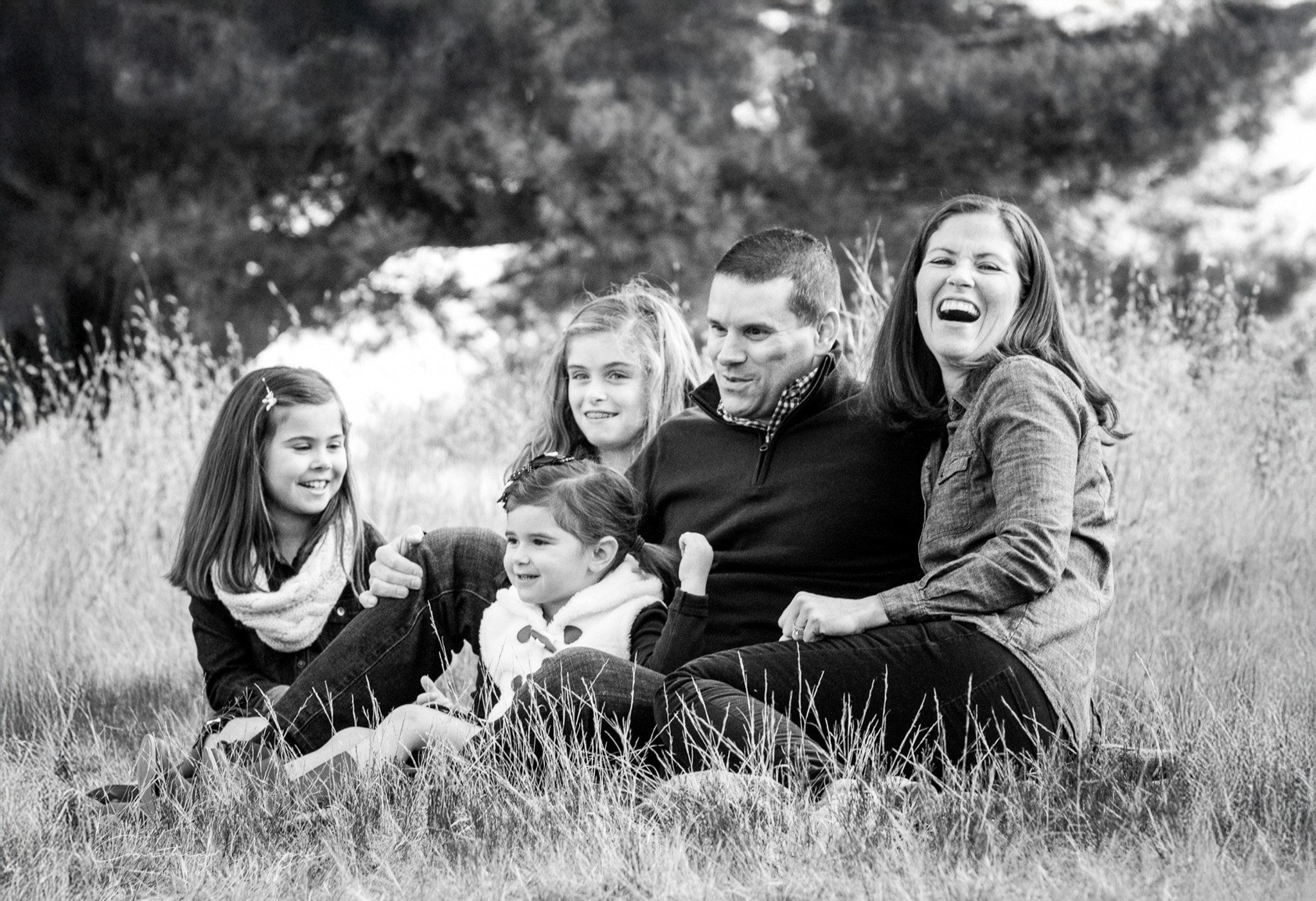 Natural family moment with real laughter captured by a Walpole and Mansfield MA photographer