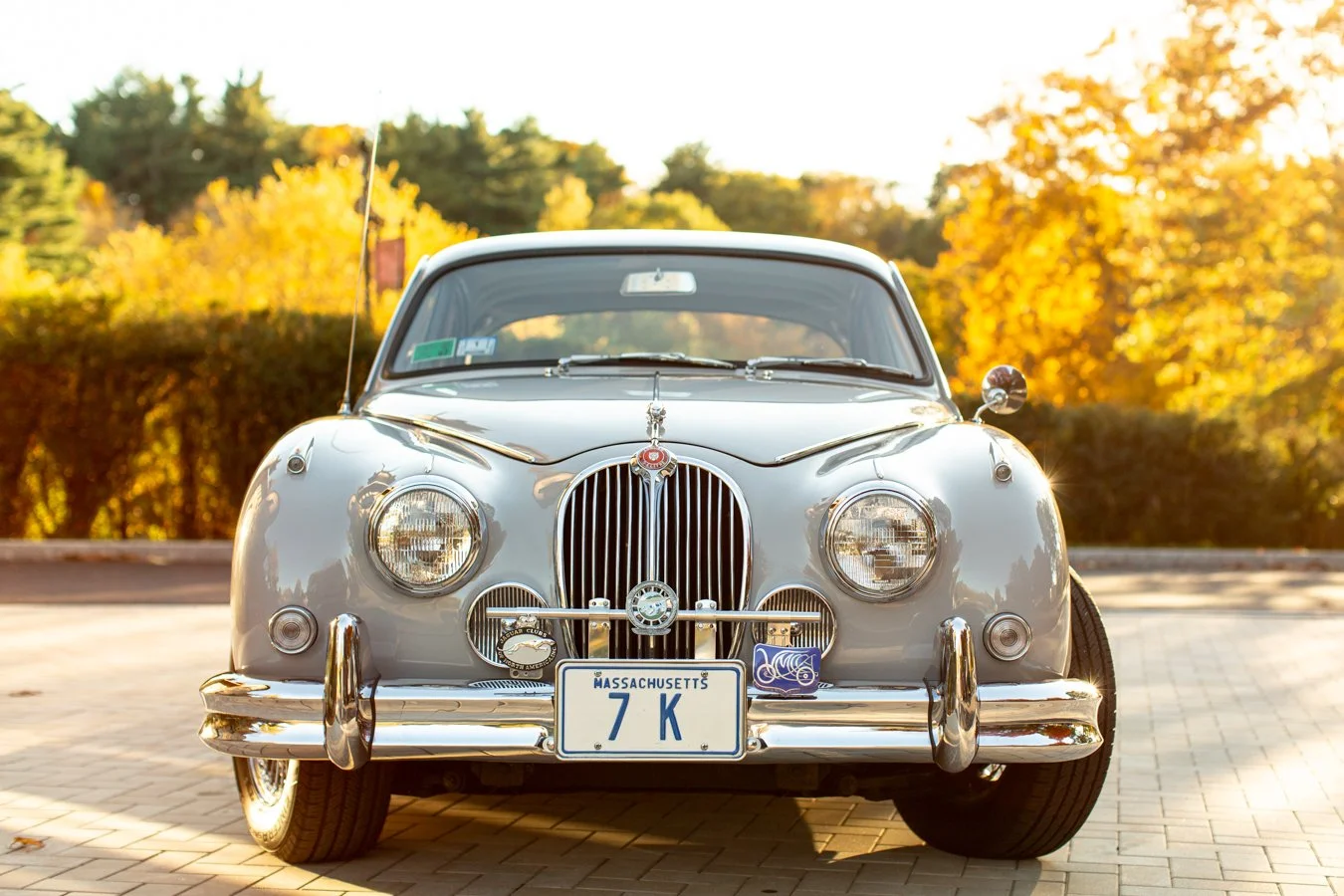 Refined vintage car outside Larz Anderson Museum in Brookline, evoking luxury and boutique photography experience.