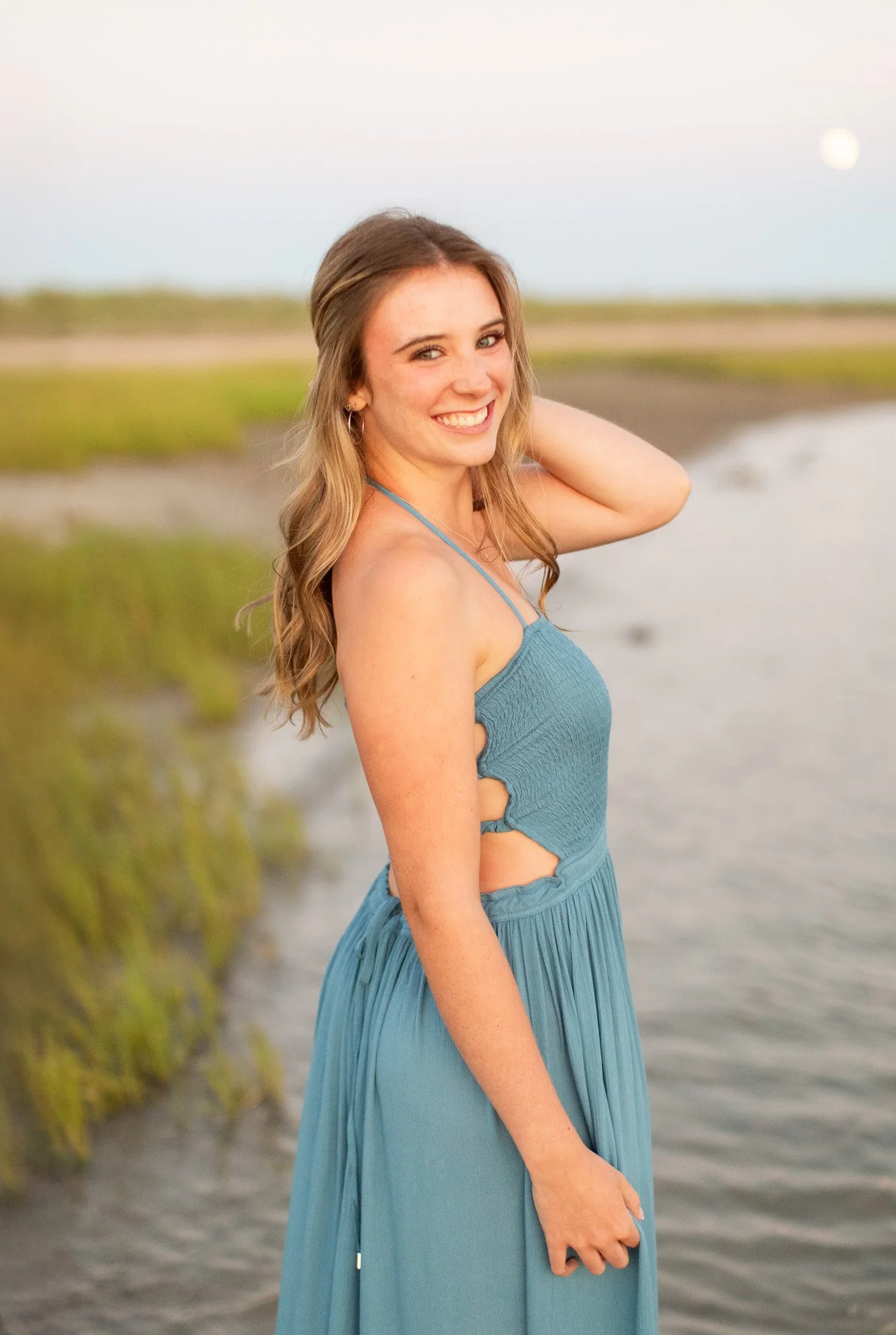 Massachusetts coastal senior photography session at Duxbury Beach during a warm summer evening.
