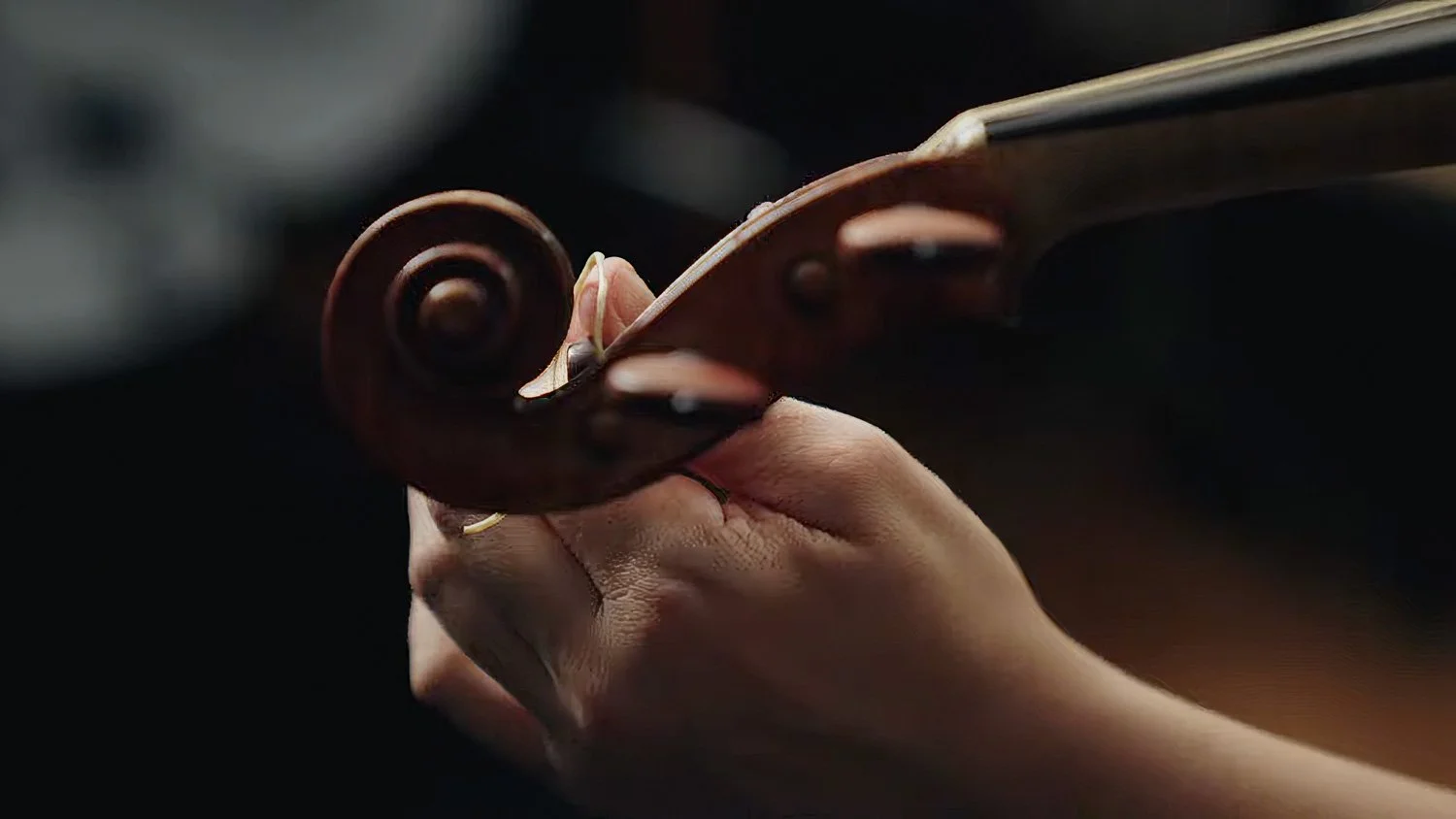 Violin being tuned to A=415 historical baroque pitch for historically informed performance