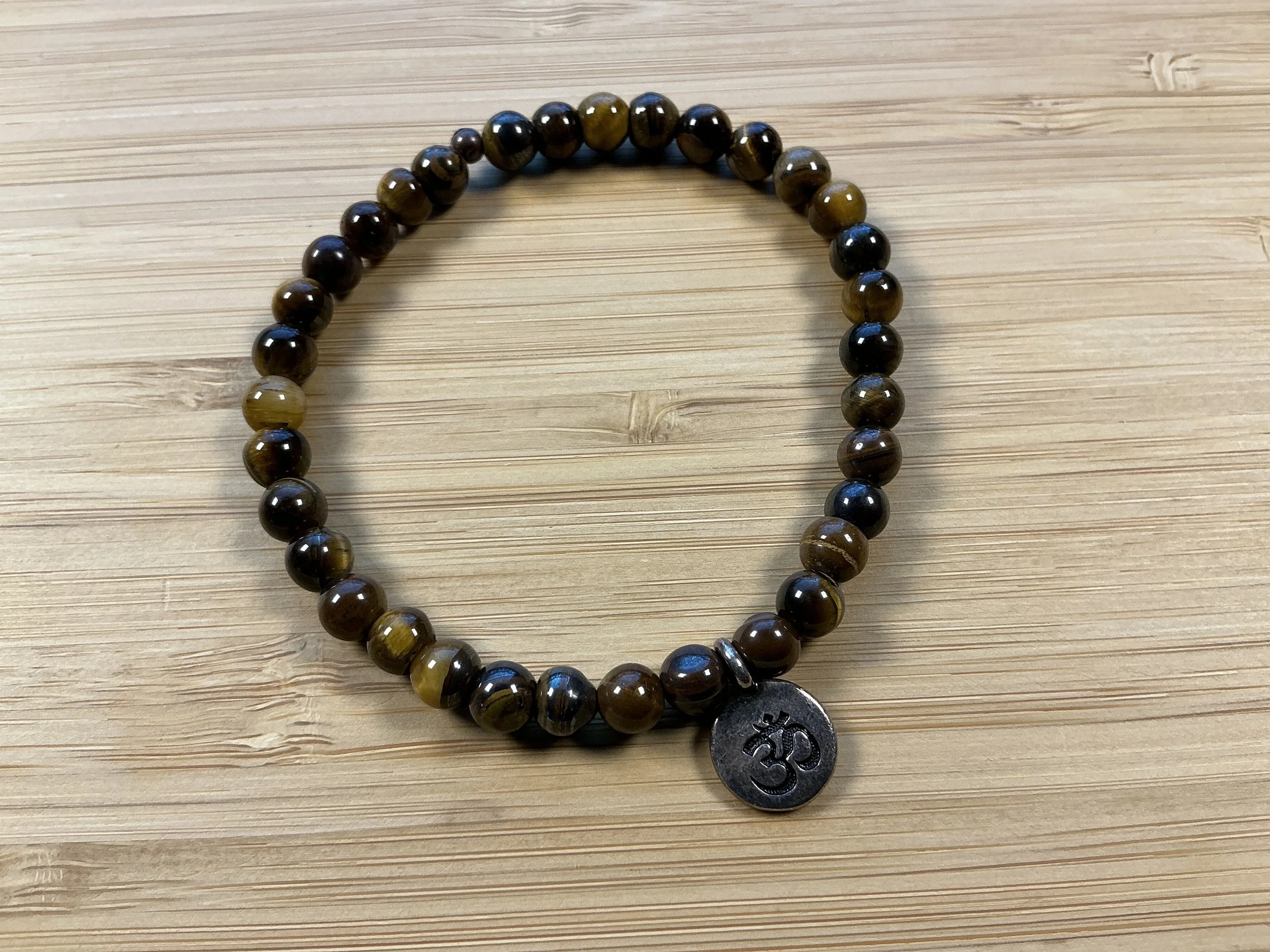 TIGER EYE OM