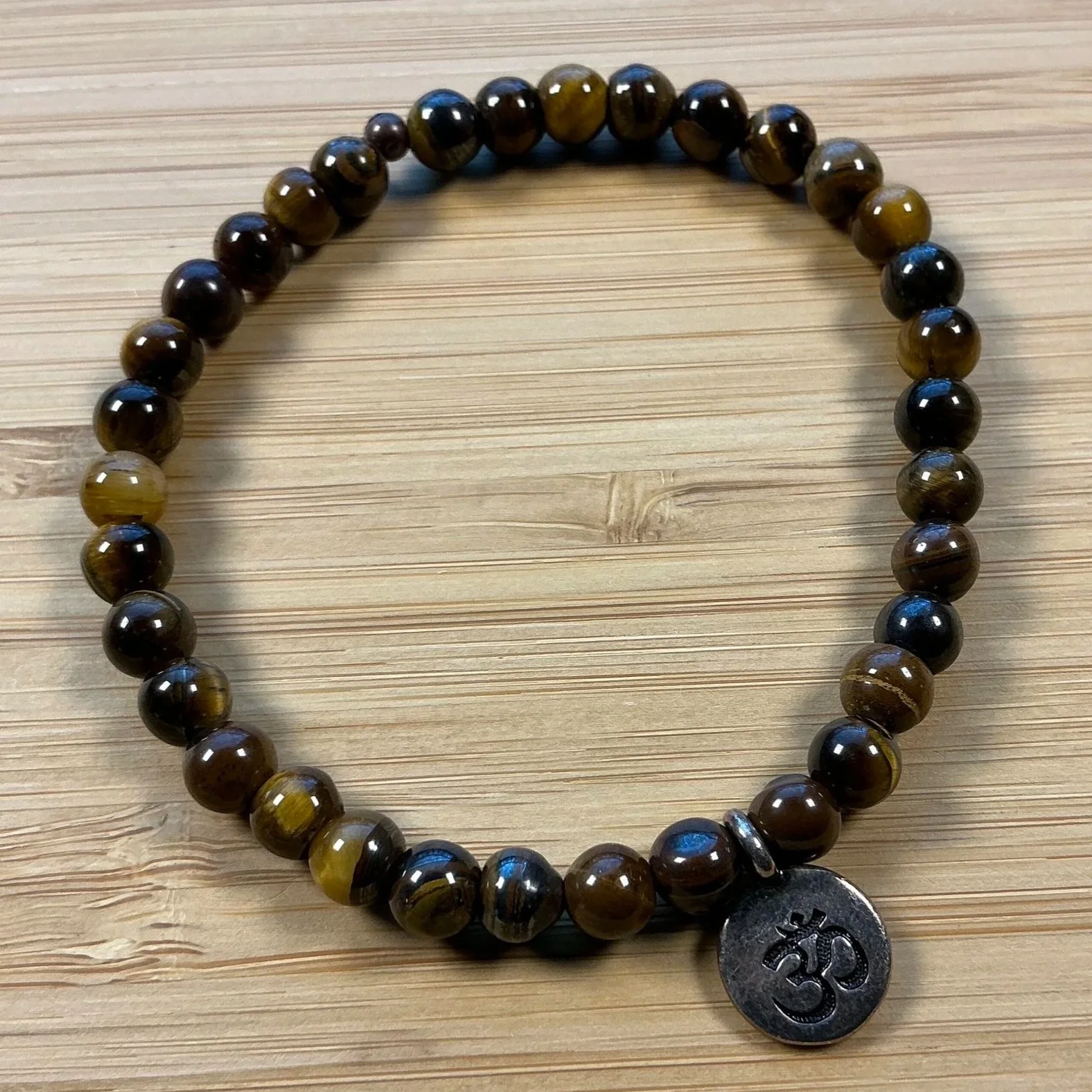 TIGER EYE OM