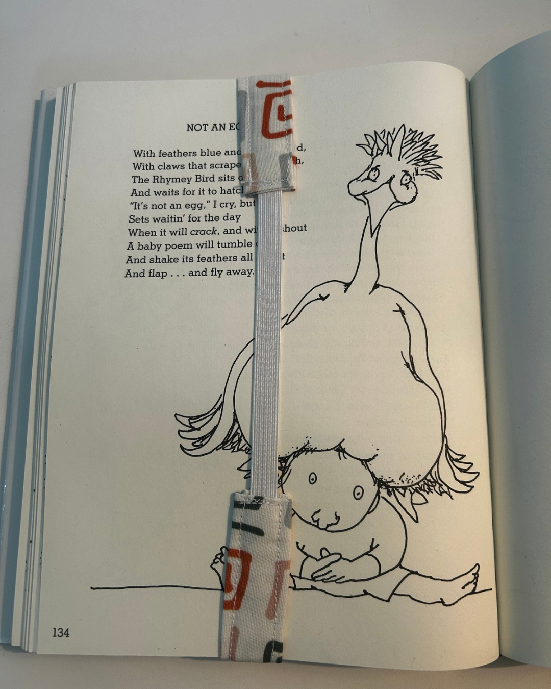 Fabric bookmark geometric swirls open book.PNG