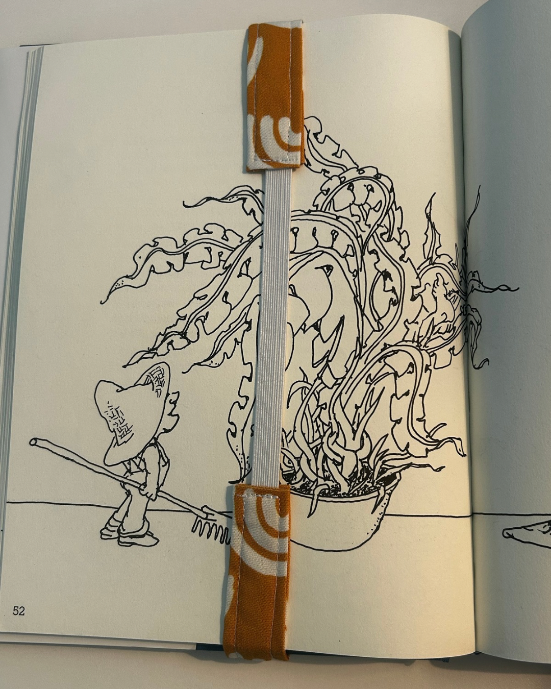 Fabric bookmark orange rainbow open book.PNG