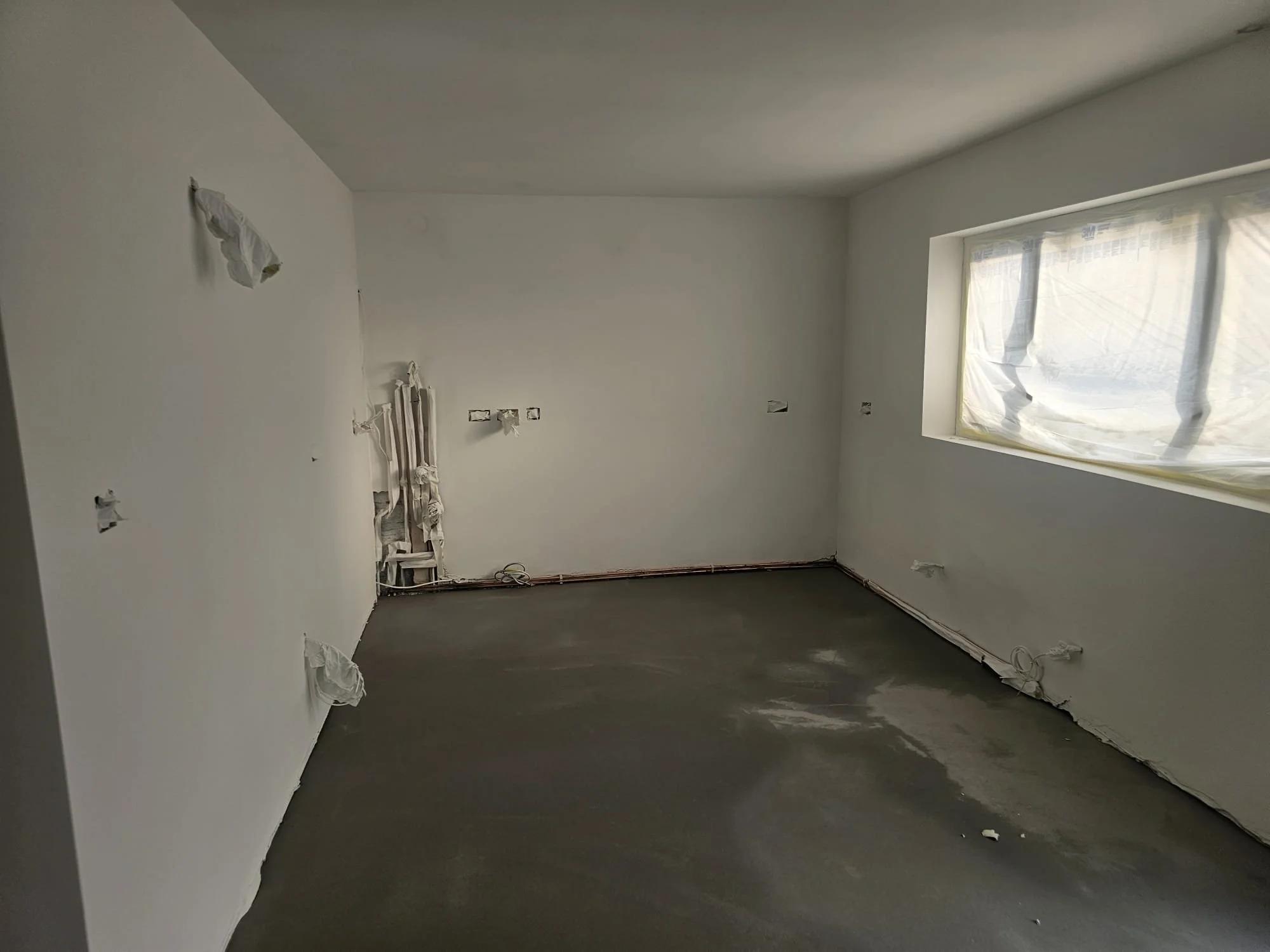 First fix wiring routed across floor and walls, Horley rewire