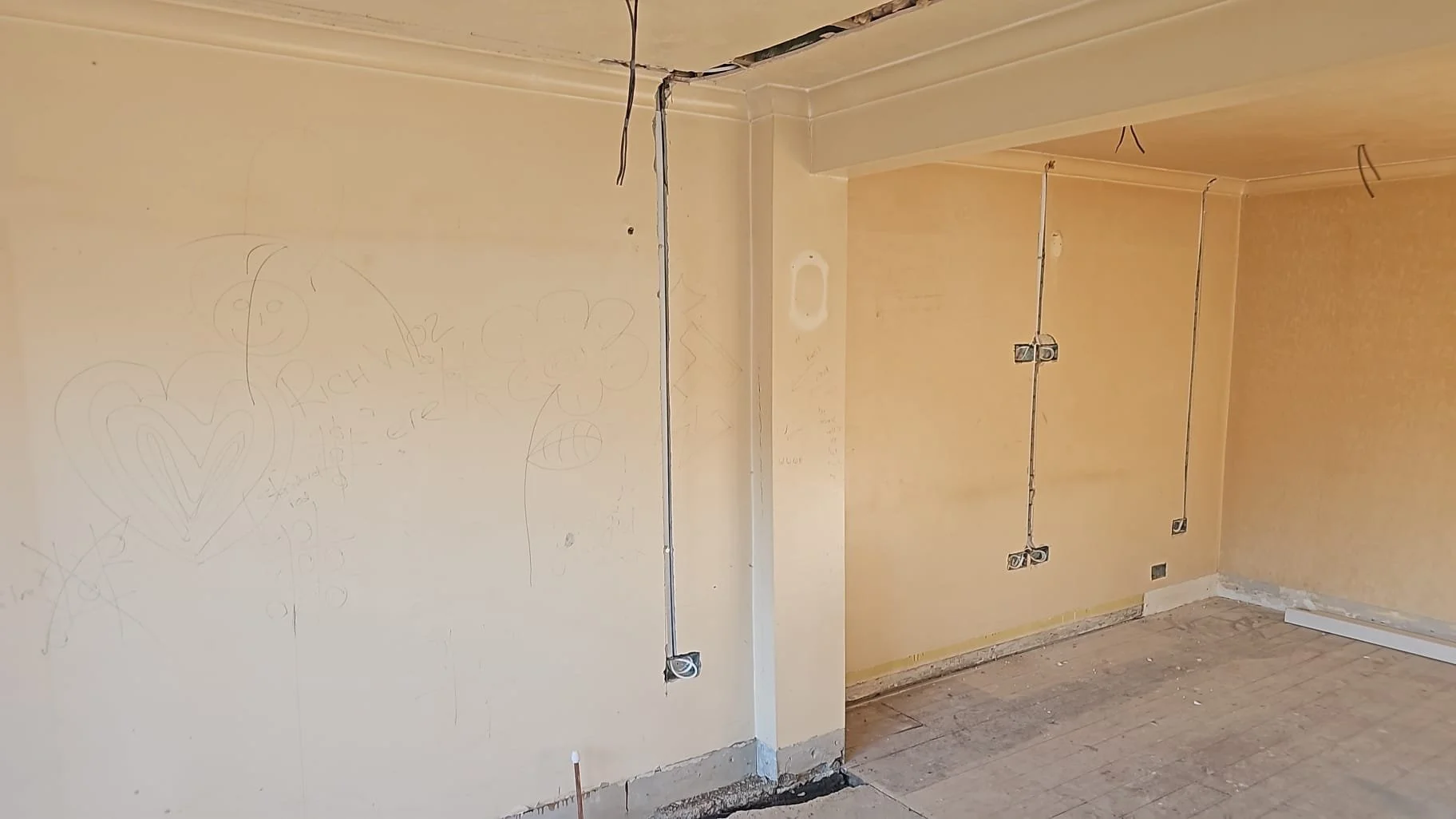 Wall chased for new wiring during full rewire, Horley