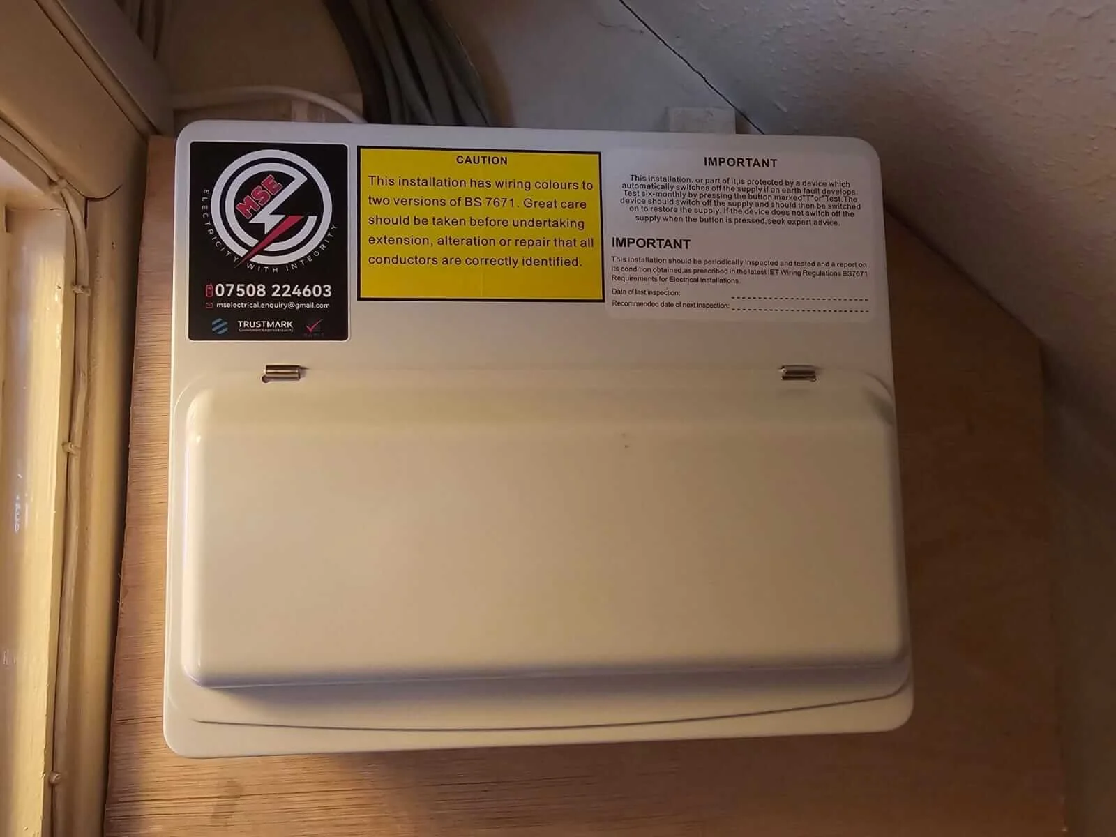 Completed consumer unit upgrade in a cupboard, Banstead, with MS Electrical Solutions label