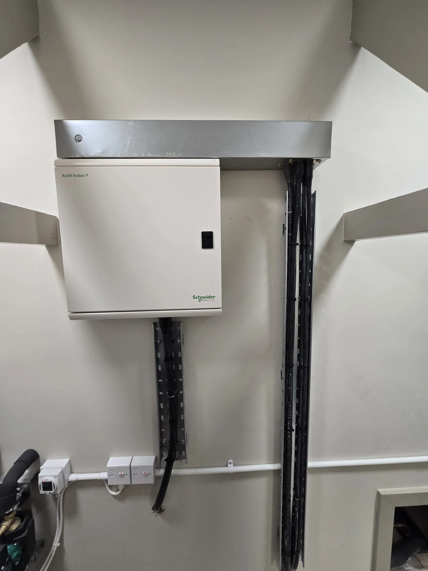 New three-phase distribution board with surge protection and isolator, installed for school air conditioning units in Ascot