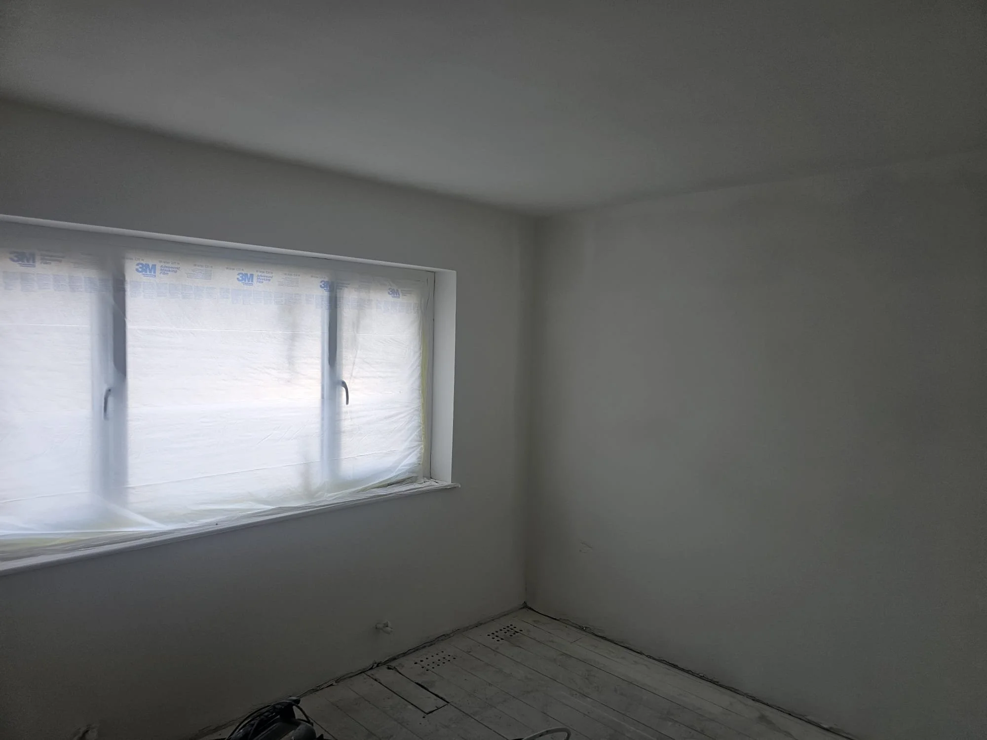 Bright room with windows ahead of second fix, Horley property