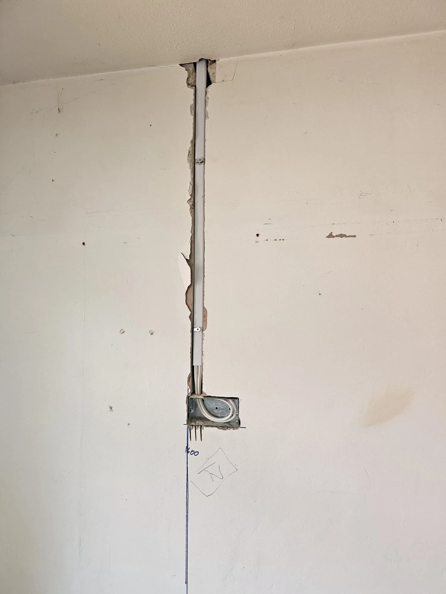 Completed first fix wiring chase before plastering