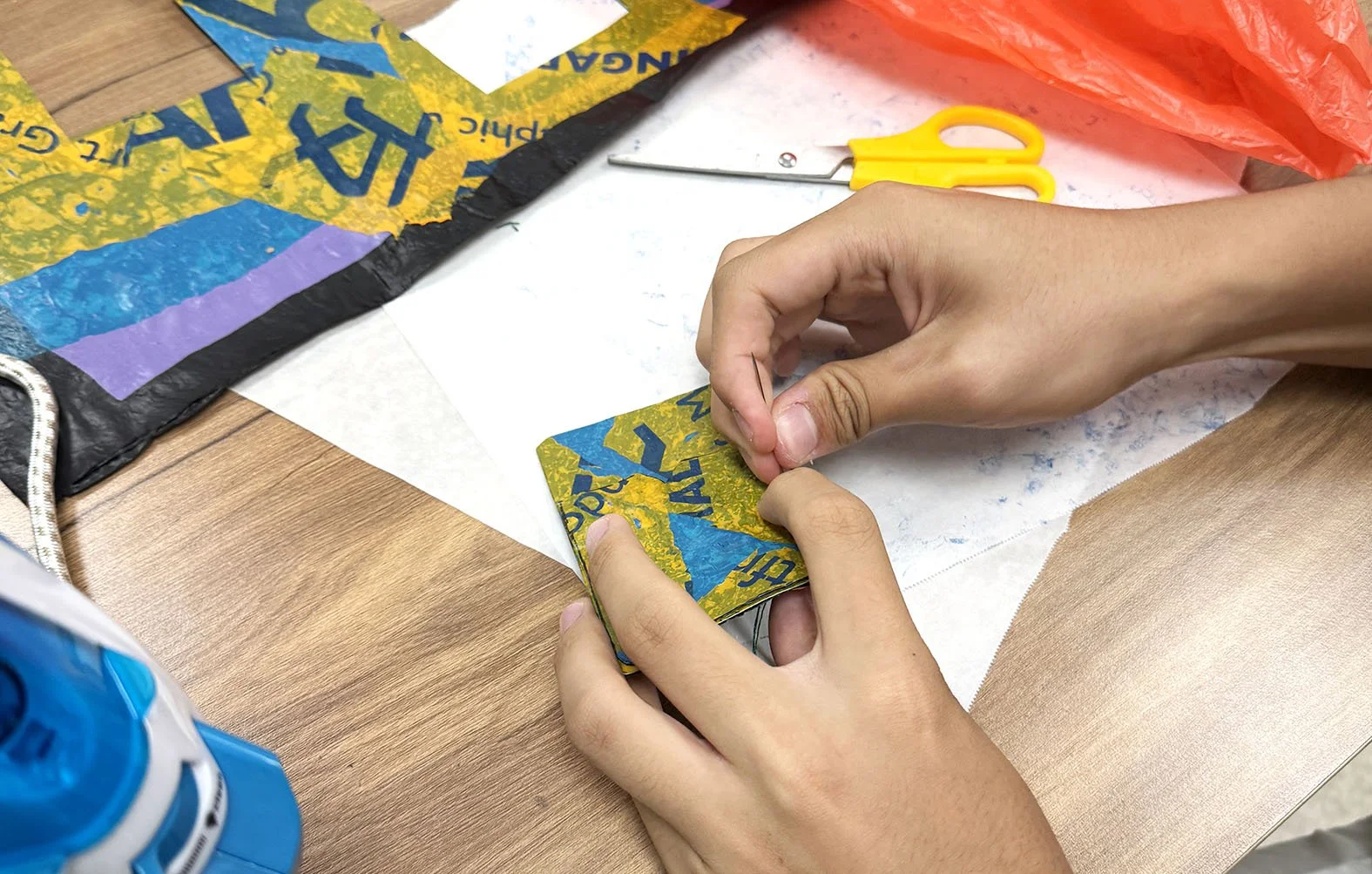 Stitching together a fuse plastic texture card holder