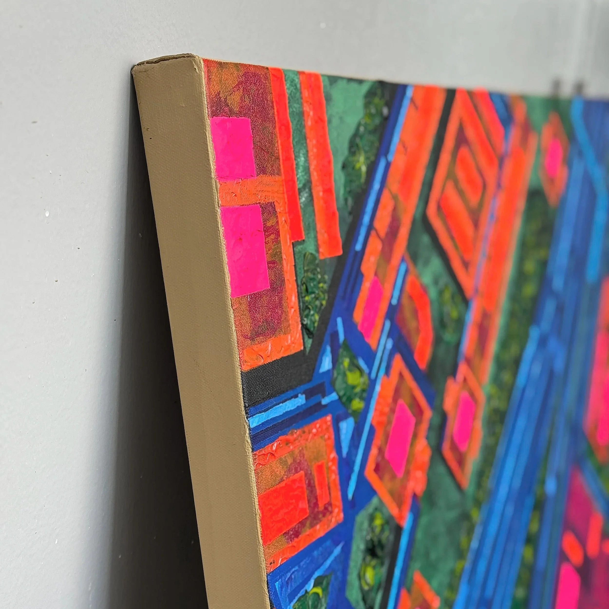 Cream coloured sides of a textured painting