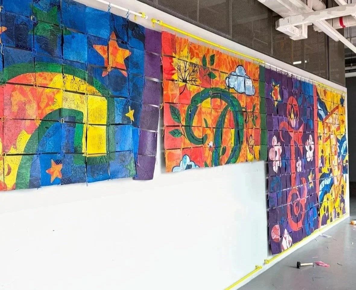 Installing the large scale fuse plastic mural
