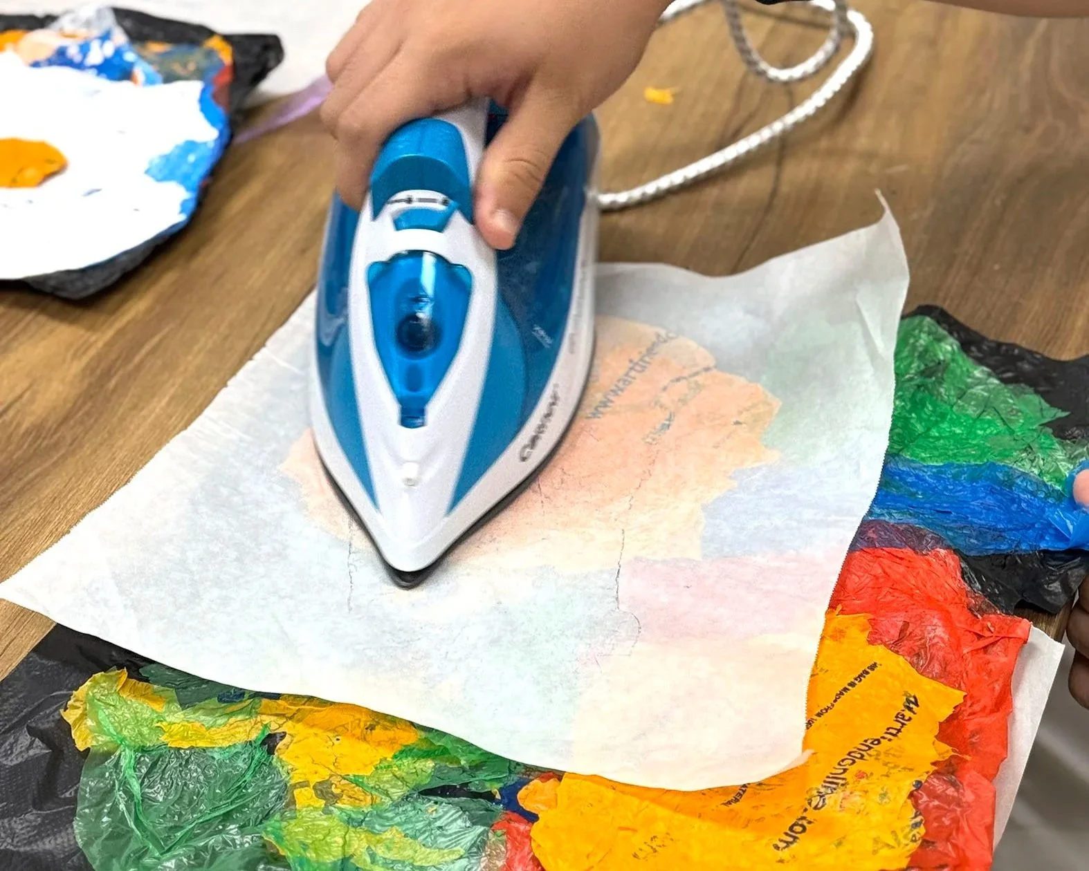 Fusing plastic bags togehter with an iron