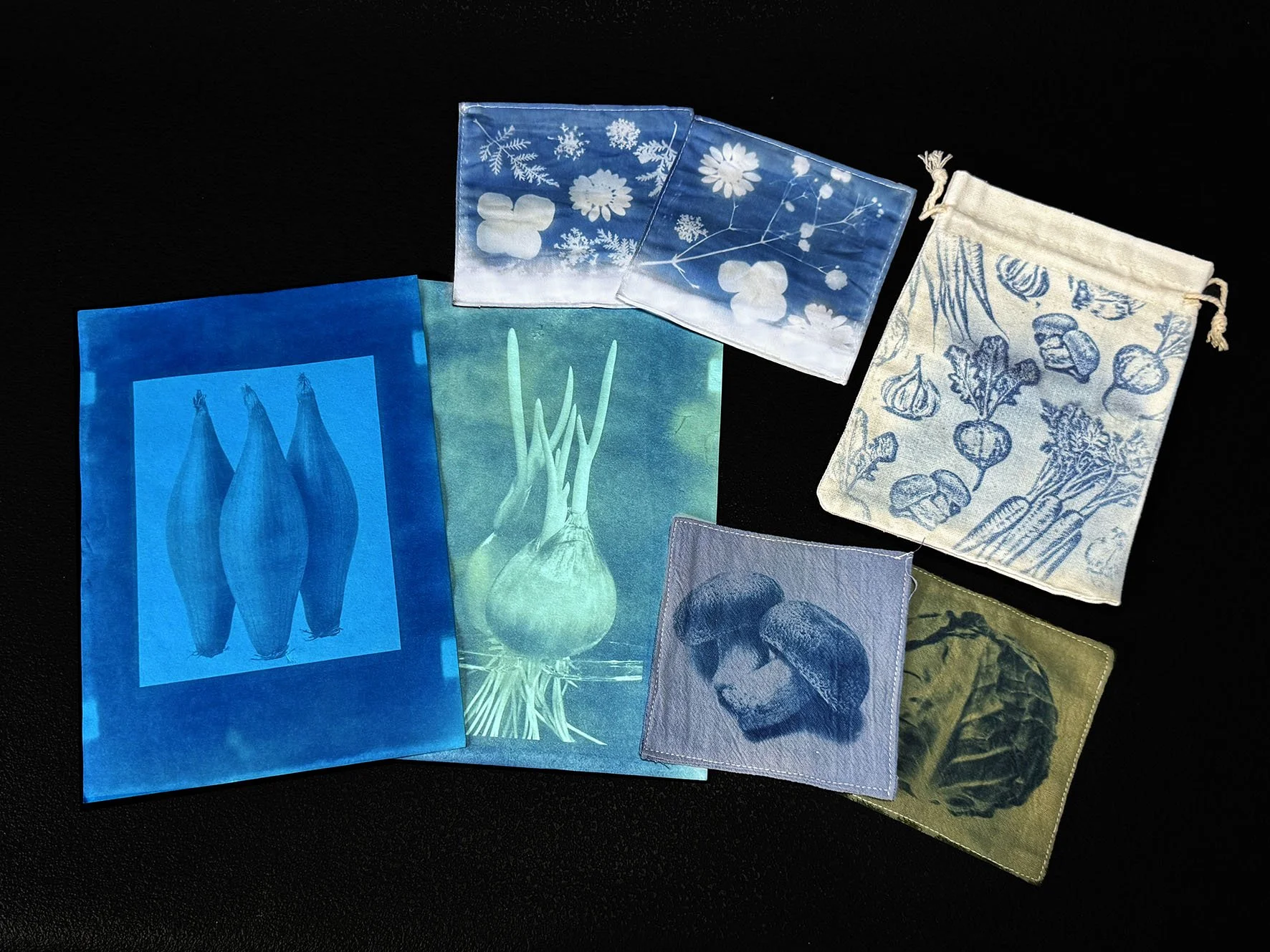 Cyanotype samples on paper, cloth coasters and drawstring bag