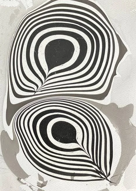 Black and white abstract patterned artwork with teardrop shapes filled with concentric curved lines.