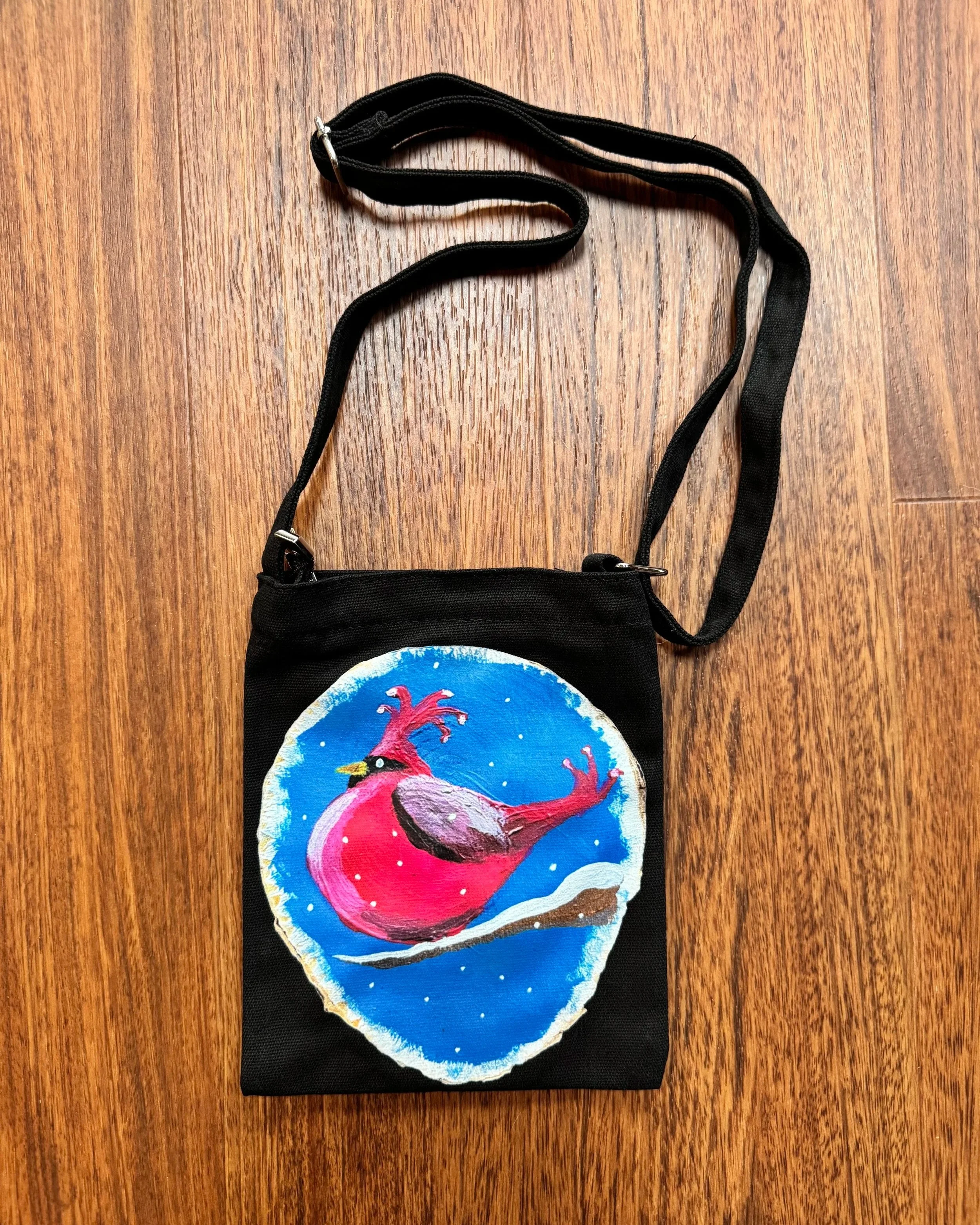 "holly jolly" black cross body;
7" x 9";
$28.00