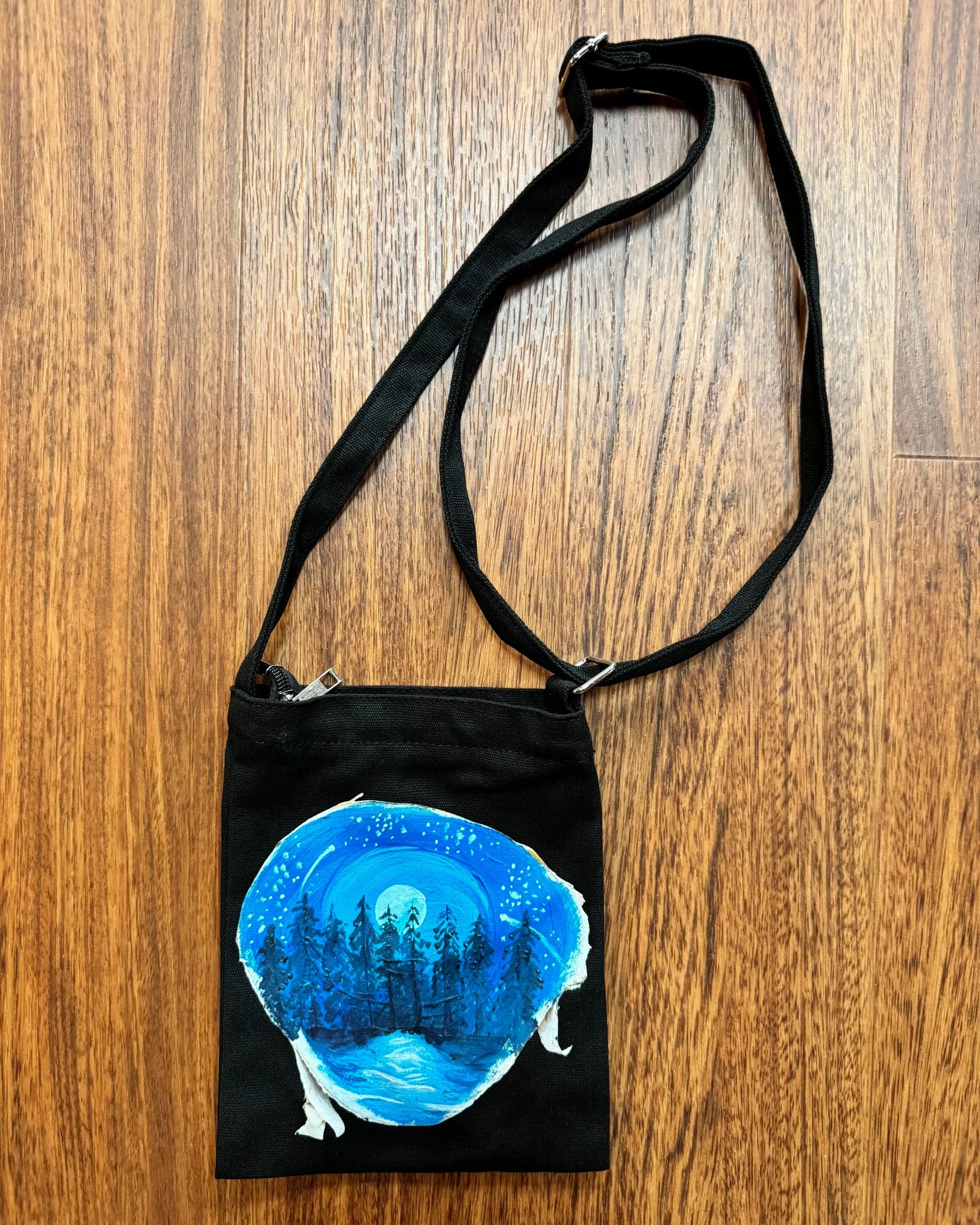 "breathe" black cross body;
7" x 9";
$28.00