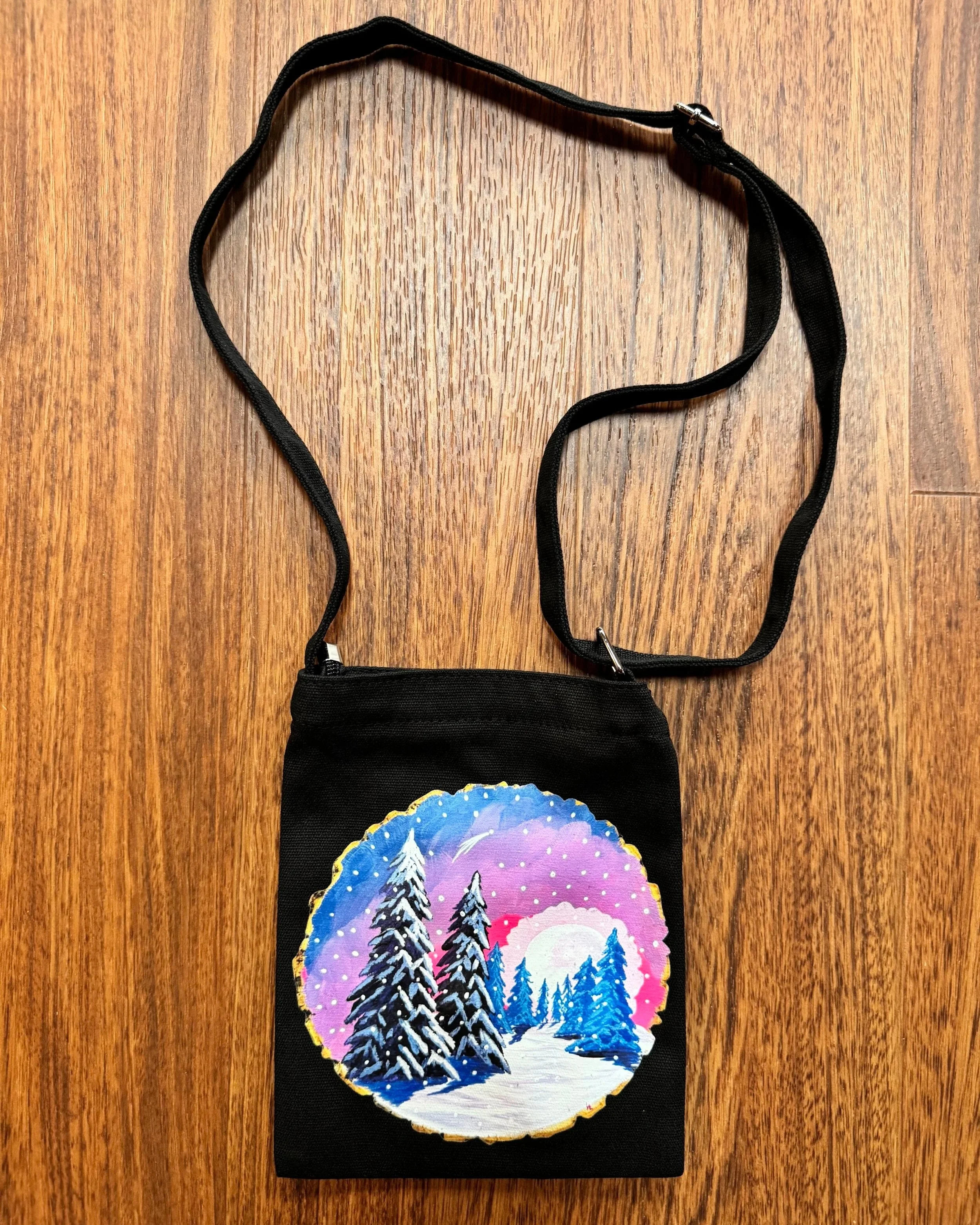 "softly" black cross body;
7" x 9";
$28.00