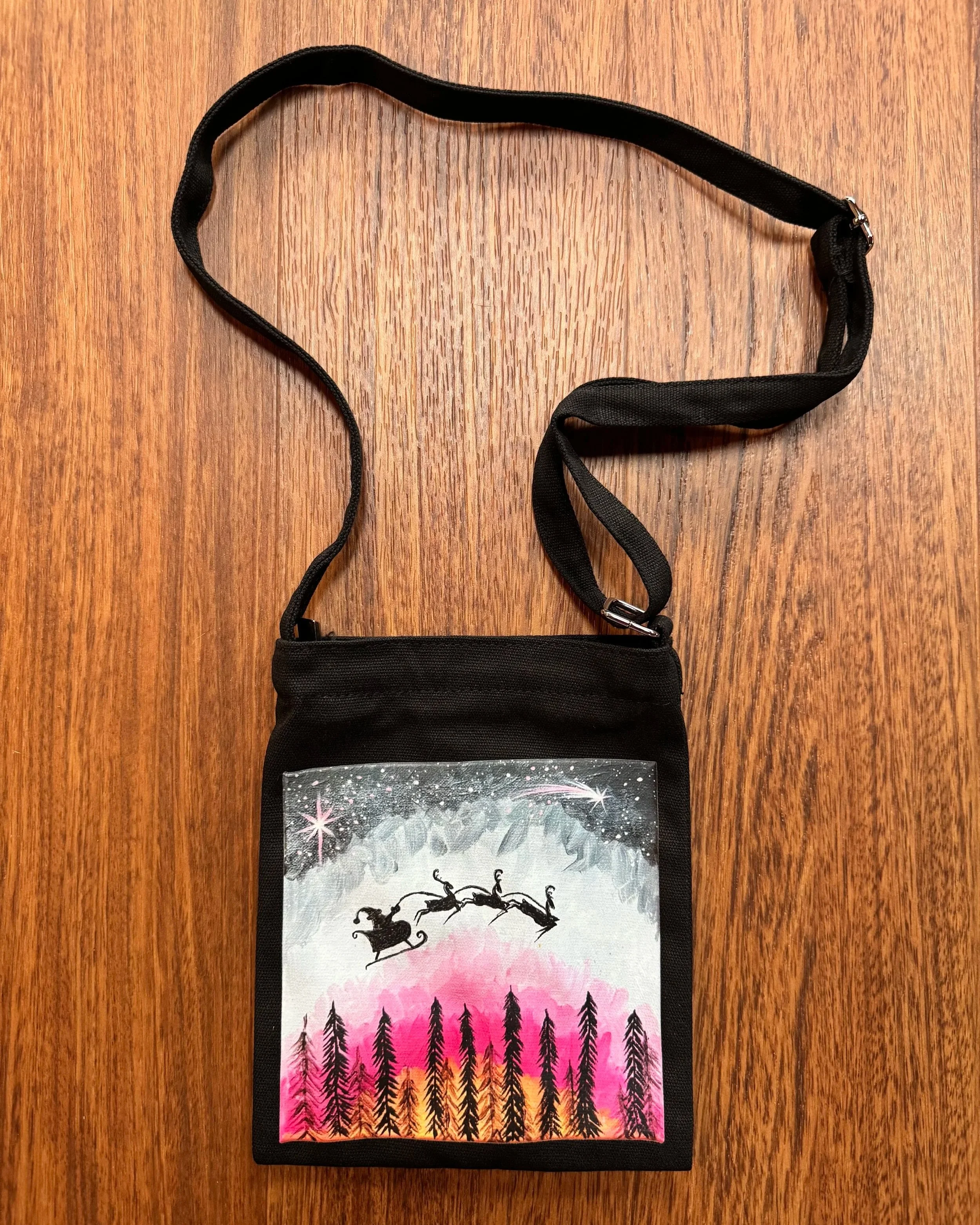 "sunset of the eve" black cross body;
7" x 9";
$28.00
