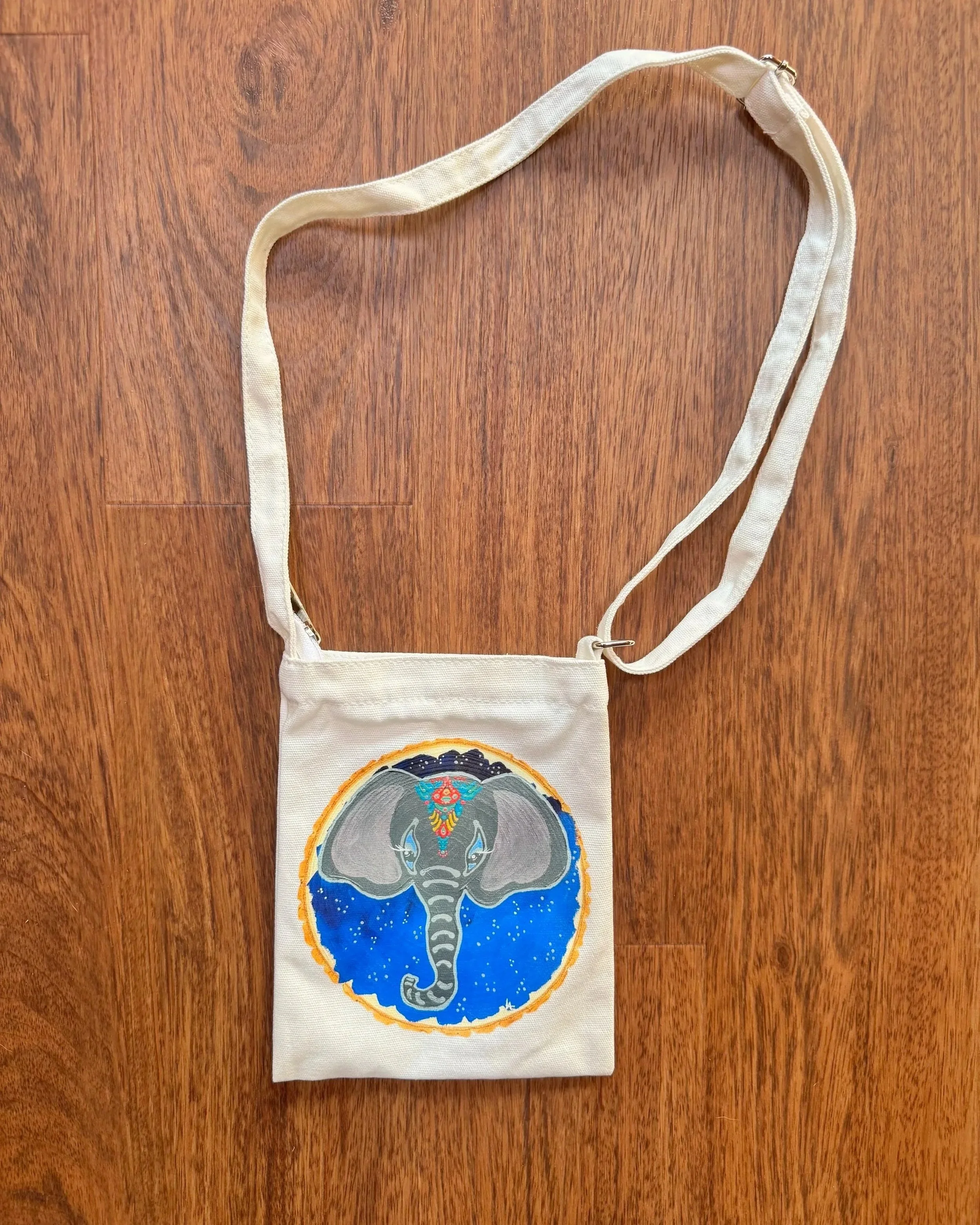 SOLD! "drishti" white cross body;
7" x 9";
$28.00