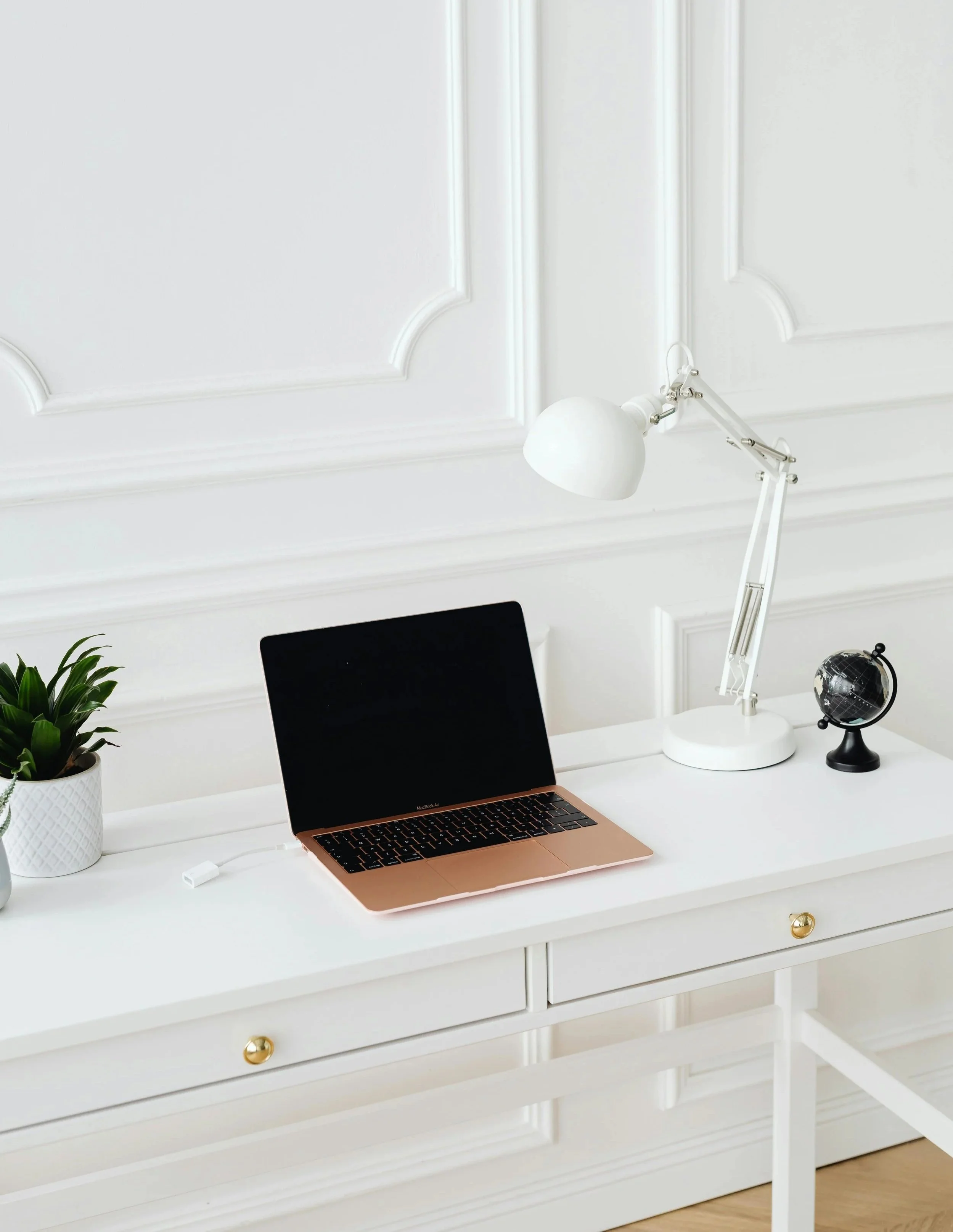 A laptop on a desk showing a virtual session for online therapy available to residents across Ontario.