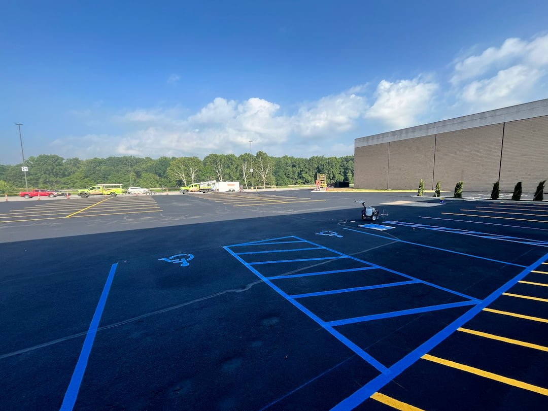 New ADA handicap parking signs installed at Grand Central Mall in Vienna WV to improve accessibility and maintain ADA compliance.