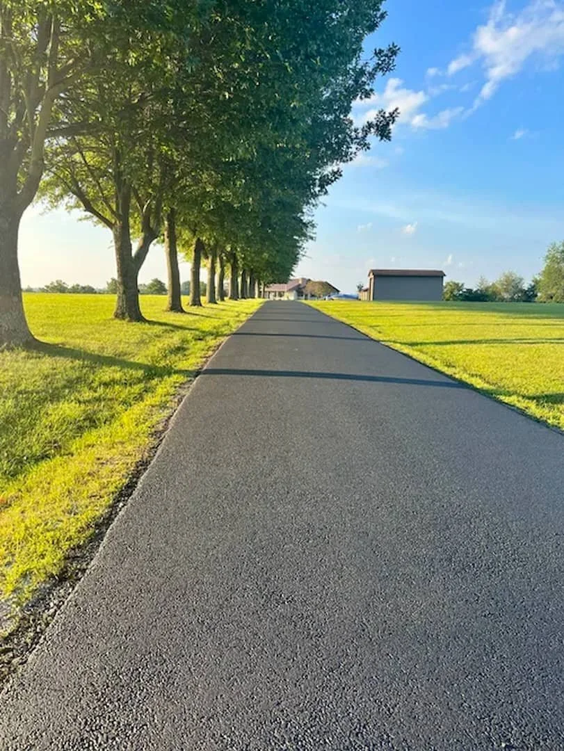 Residential asphalt driveway sealing services in Parkersburg WV by Elite Pavement Maintenance.
