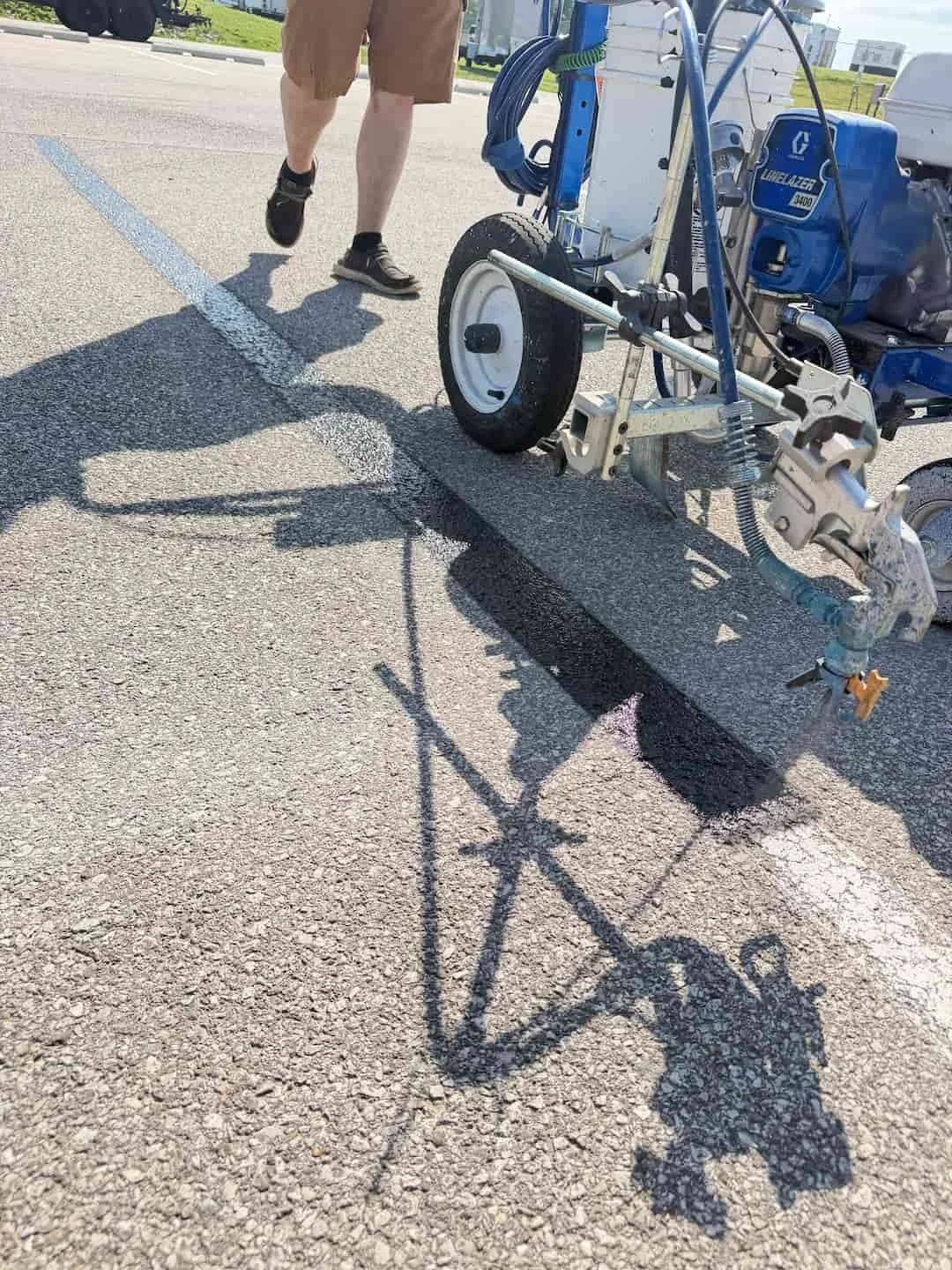 Parking lot striping removal and layout changes at Great Bend Marina in Ravenswood WV.