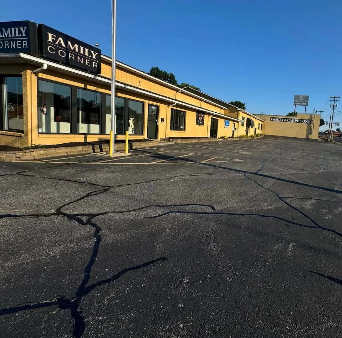 Asphalt crack filling services in Parkersburg WV by Elite Pavement Maintenance to prevent water damage and extend pavement life.