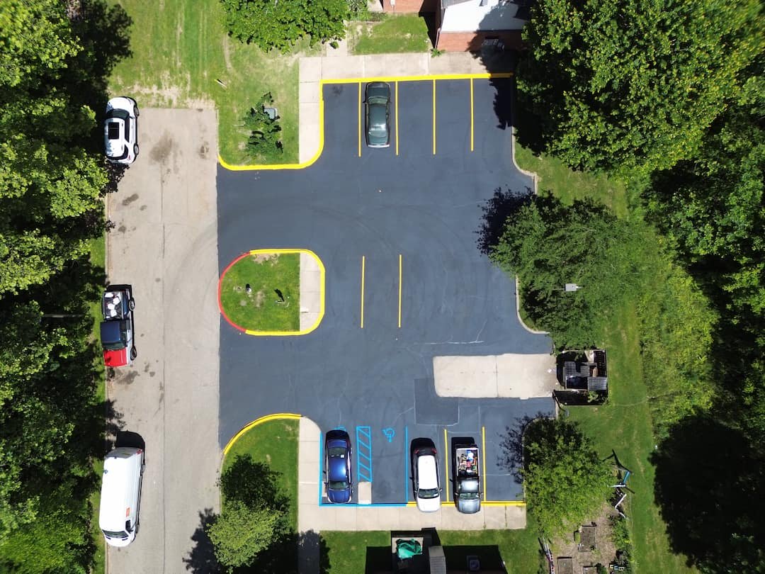 Commercial parking lot striping in Athens OH with fresh markings improving safety and visibility.