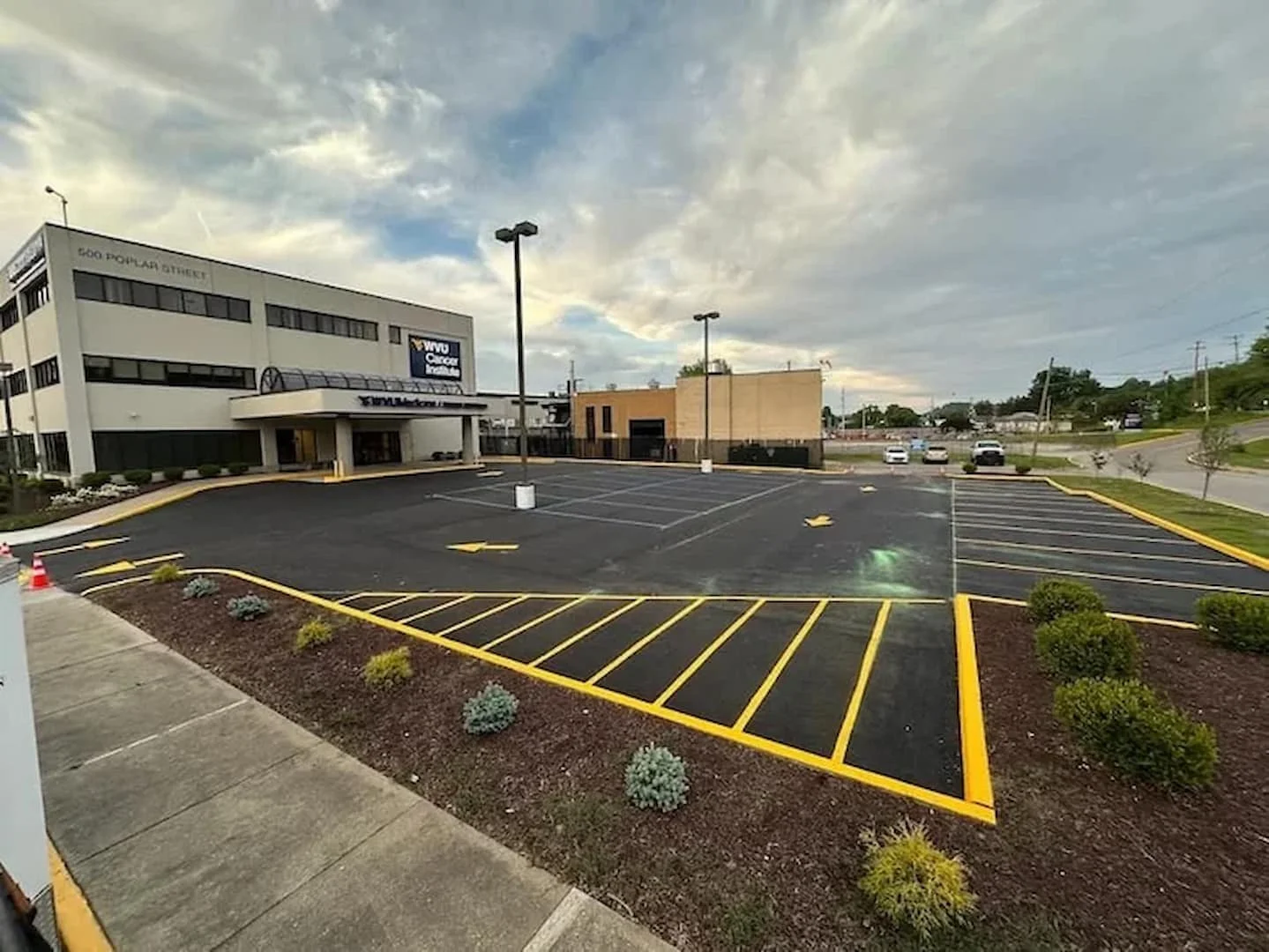 Parking lot line striping services in Parkersburg WV by Elite Pavement Maintenance for clear and compliant parking layouts.