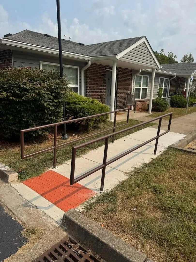 Commercial handrail installation services in Parkersburg WV by Elite Pavement Maintenance for safety and ADA accessibility.
