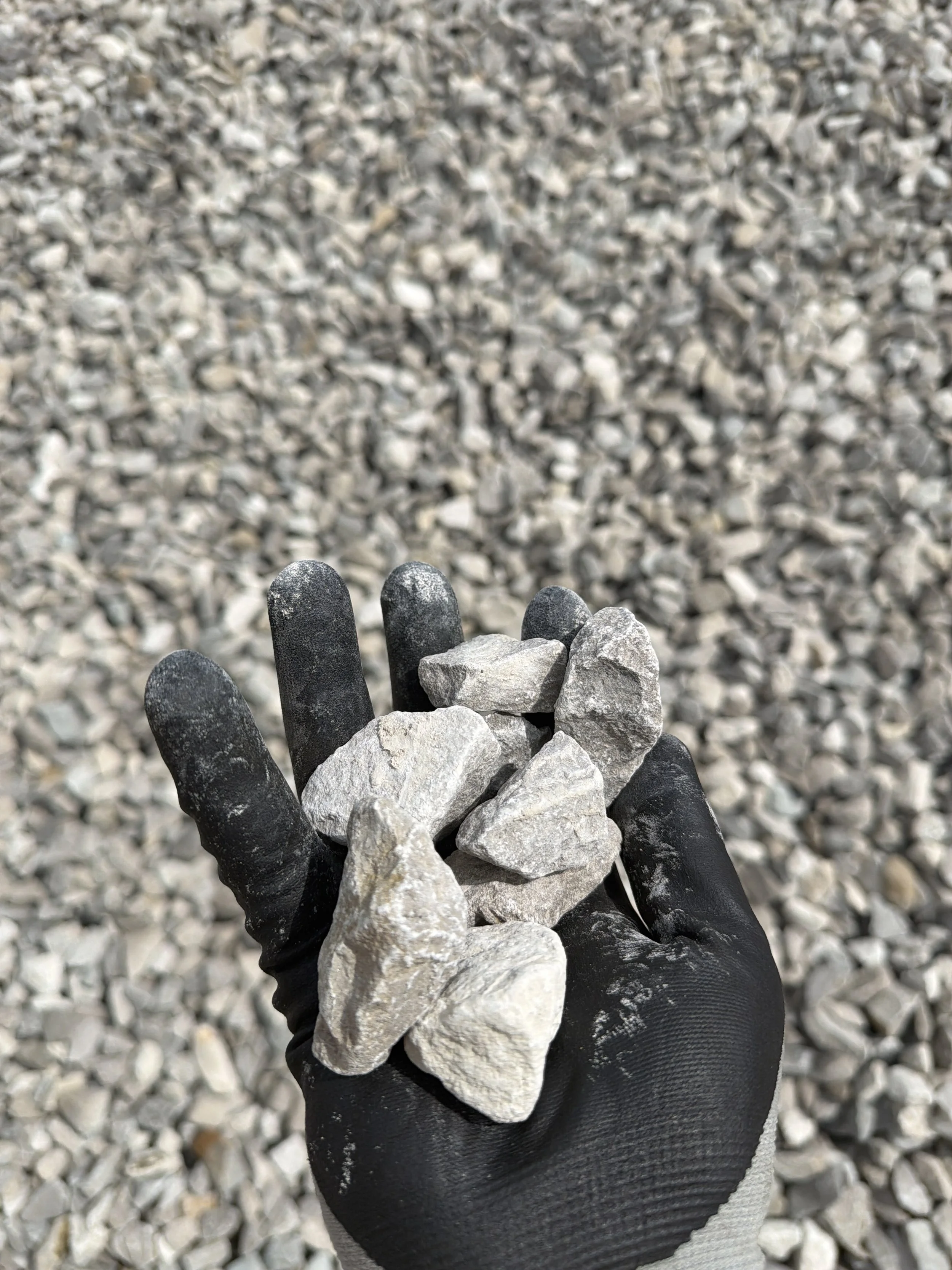 #57 gravel delivery in Parkersburg WV for drainage systems, driveways, landscaping, pipe bedding, and construction projects.