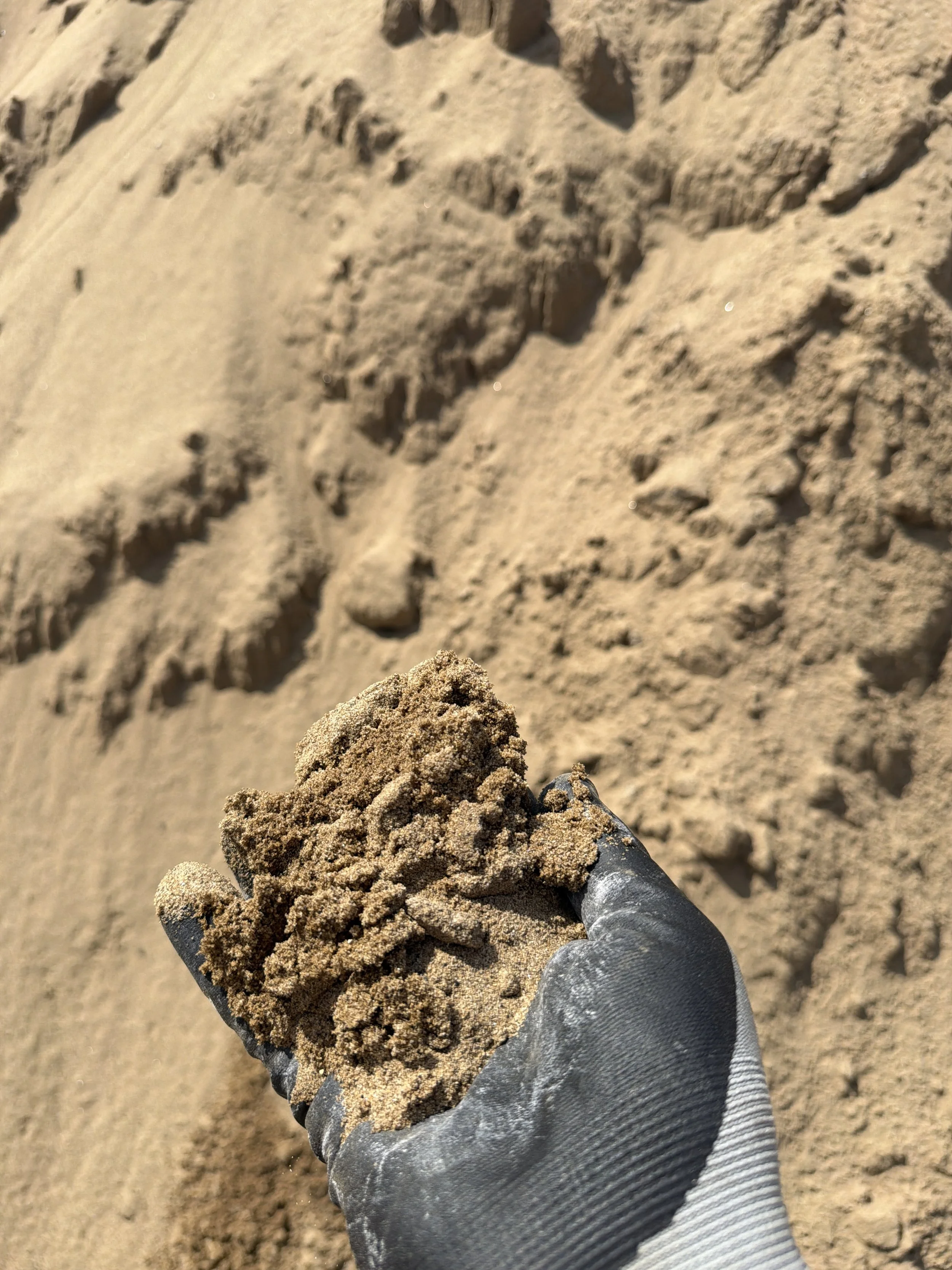 Masonry sand delivery in Parkersburg WV for paver installations, masonry work, landscaping projects, playgrounds, and construction applications.