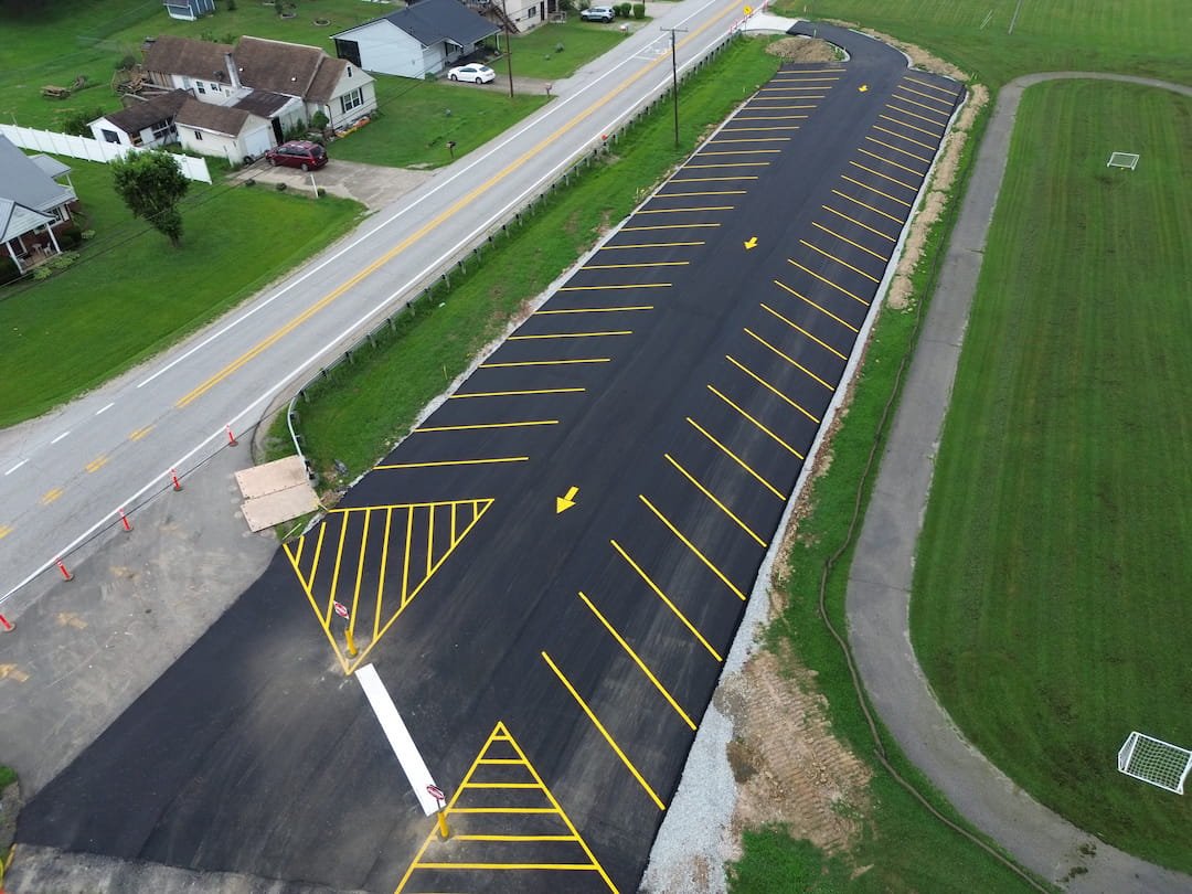 New parking and ADA sign installation completed at Kanawha Elementary School in Davisville WV to improve safety and accessibility.
